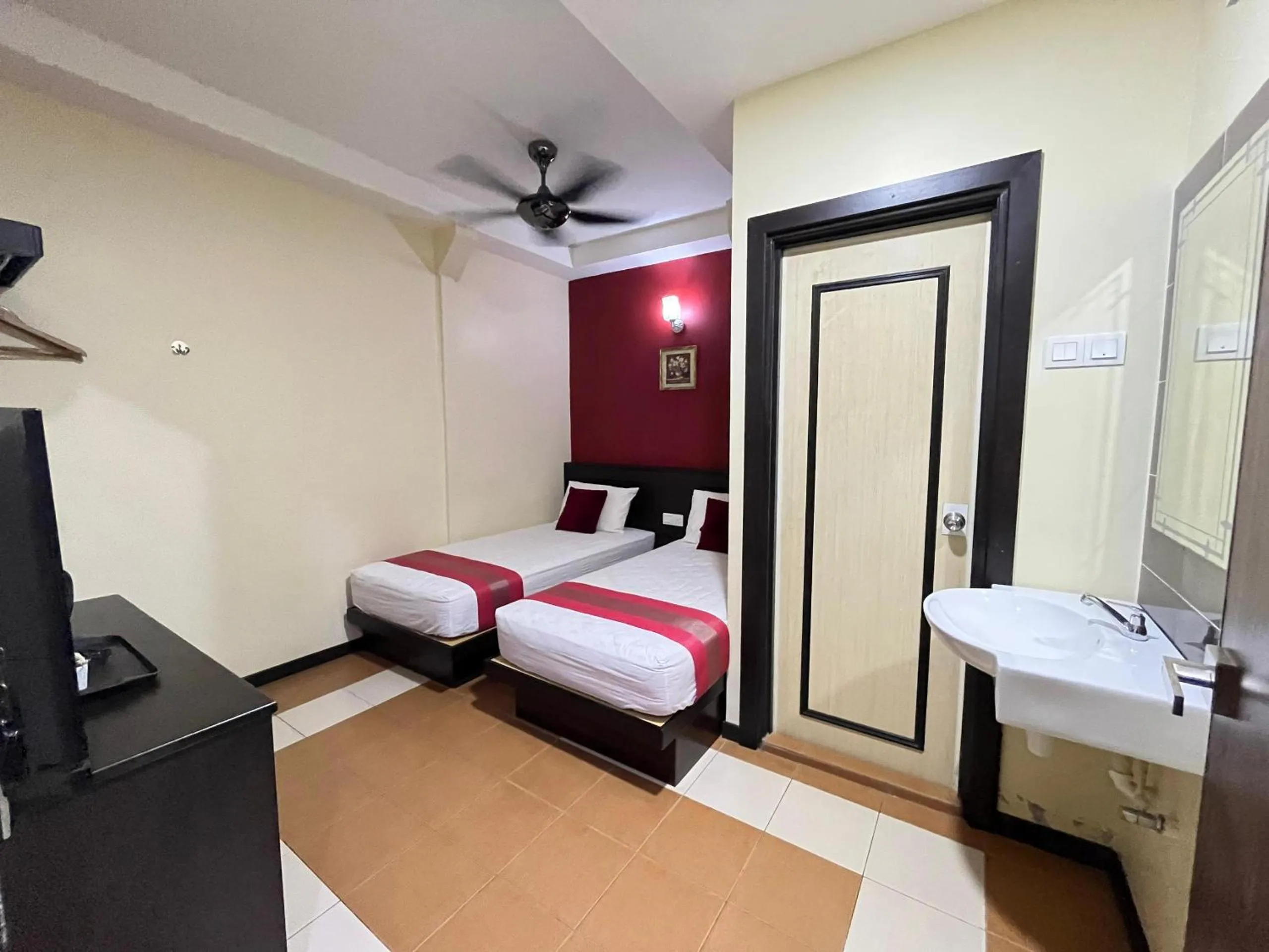 Bed in Sera Sentosa Inn