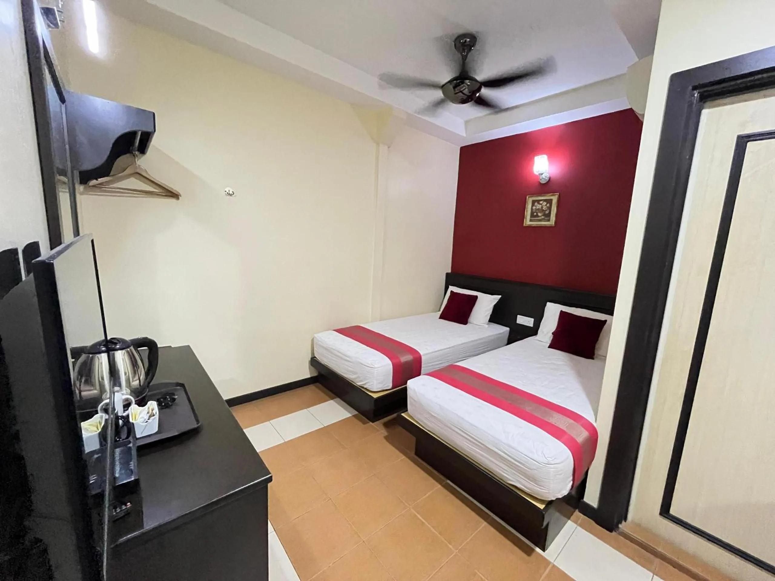 Bed in Sera Sentosa Inn