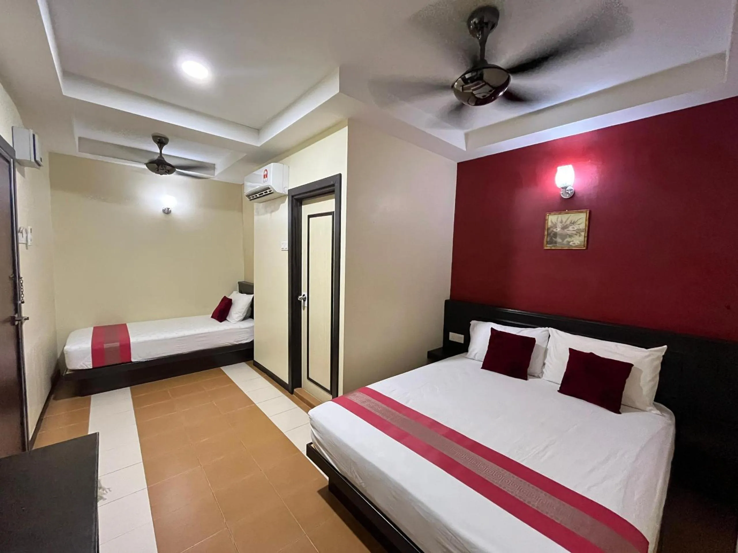 Bed in Sera Sentosa Inn