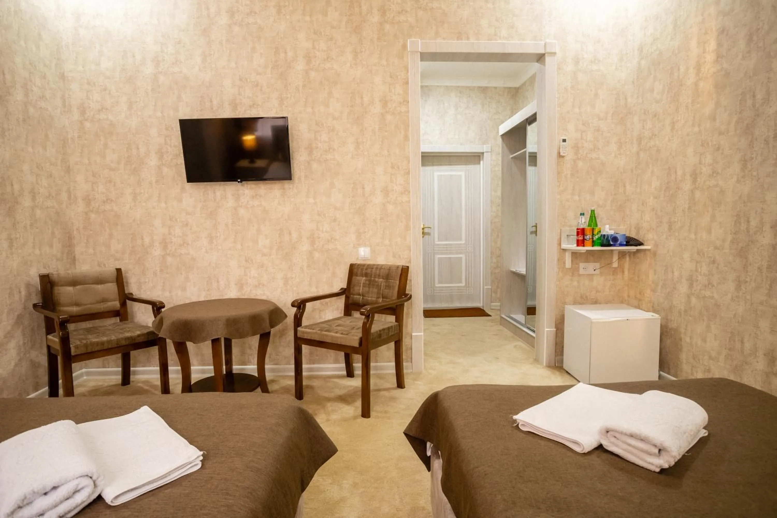 Bed in Osiyo Plaza Hotel