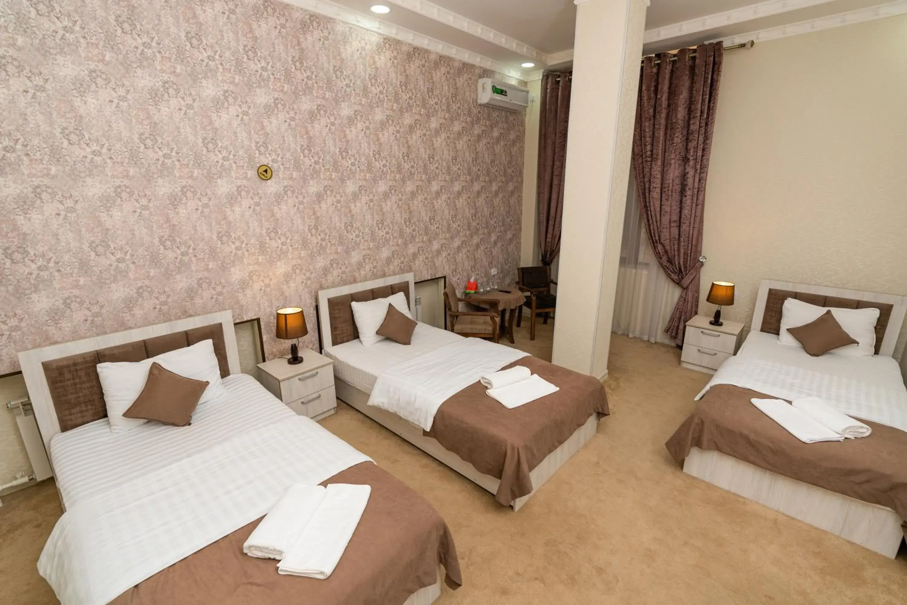 Triple Room in Osiyo Plaza Hotel Triple Room in Osiyo Plaza Hotel