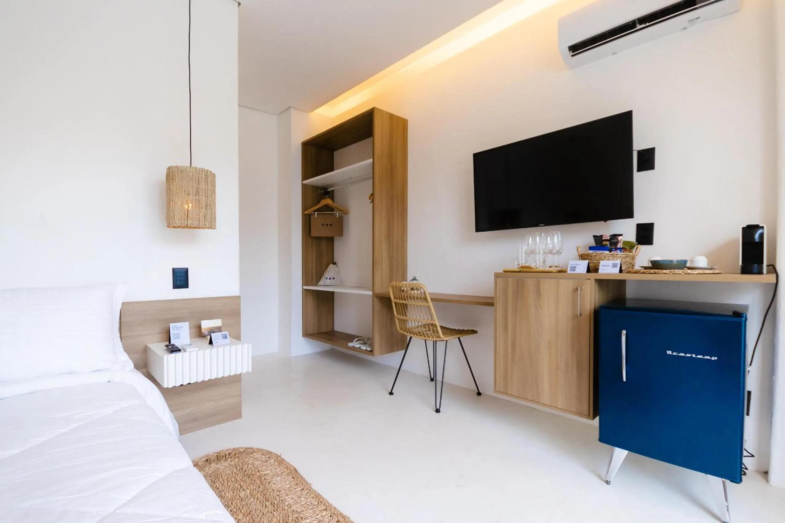 Bed in Mikiki Lifestyle Hotel