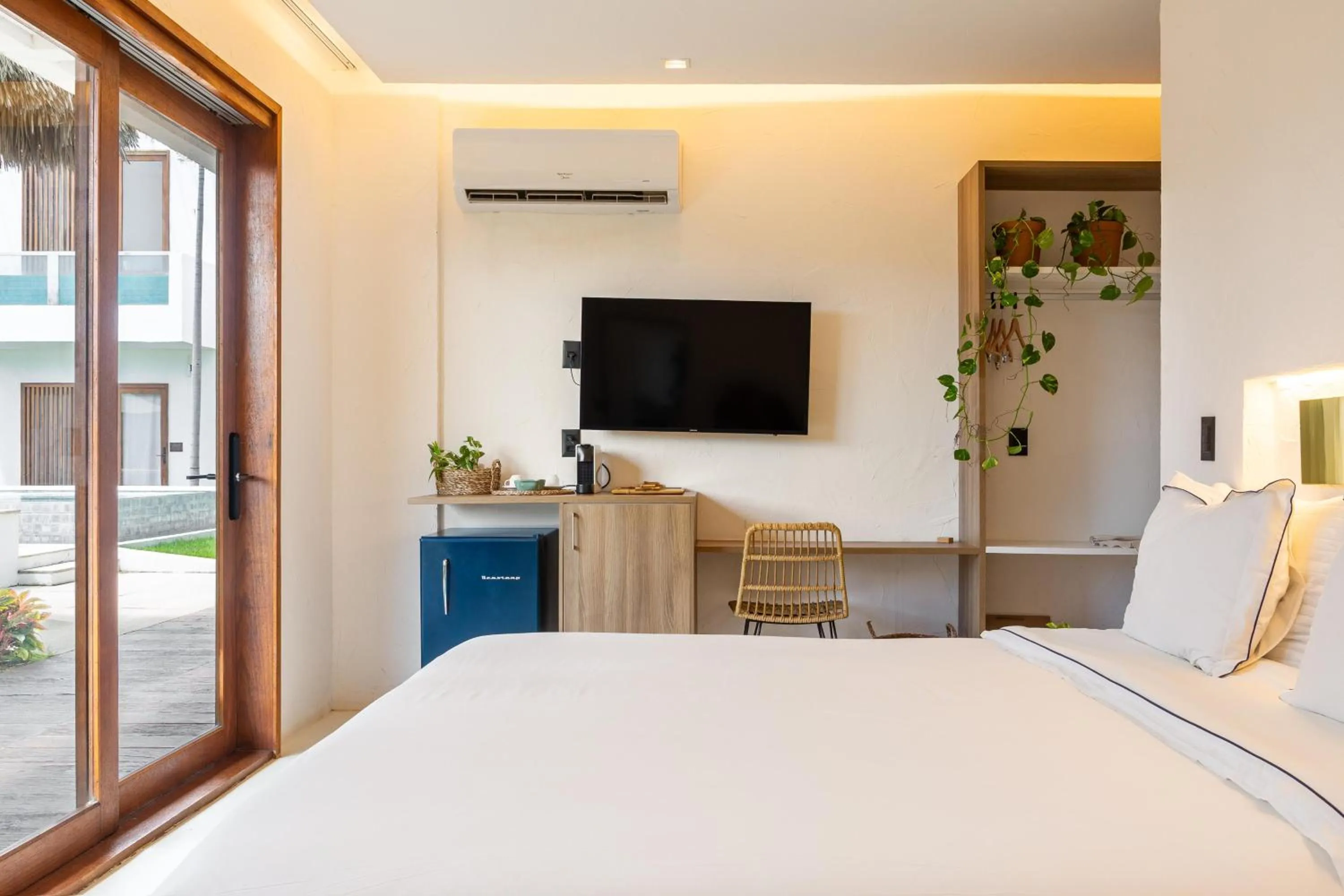 Luxury Triple Room in Mikiki Lifestyle Hotel