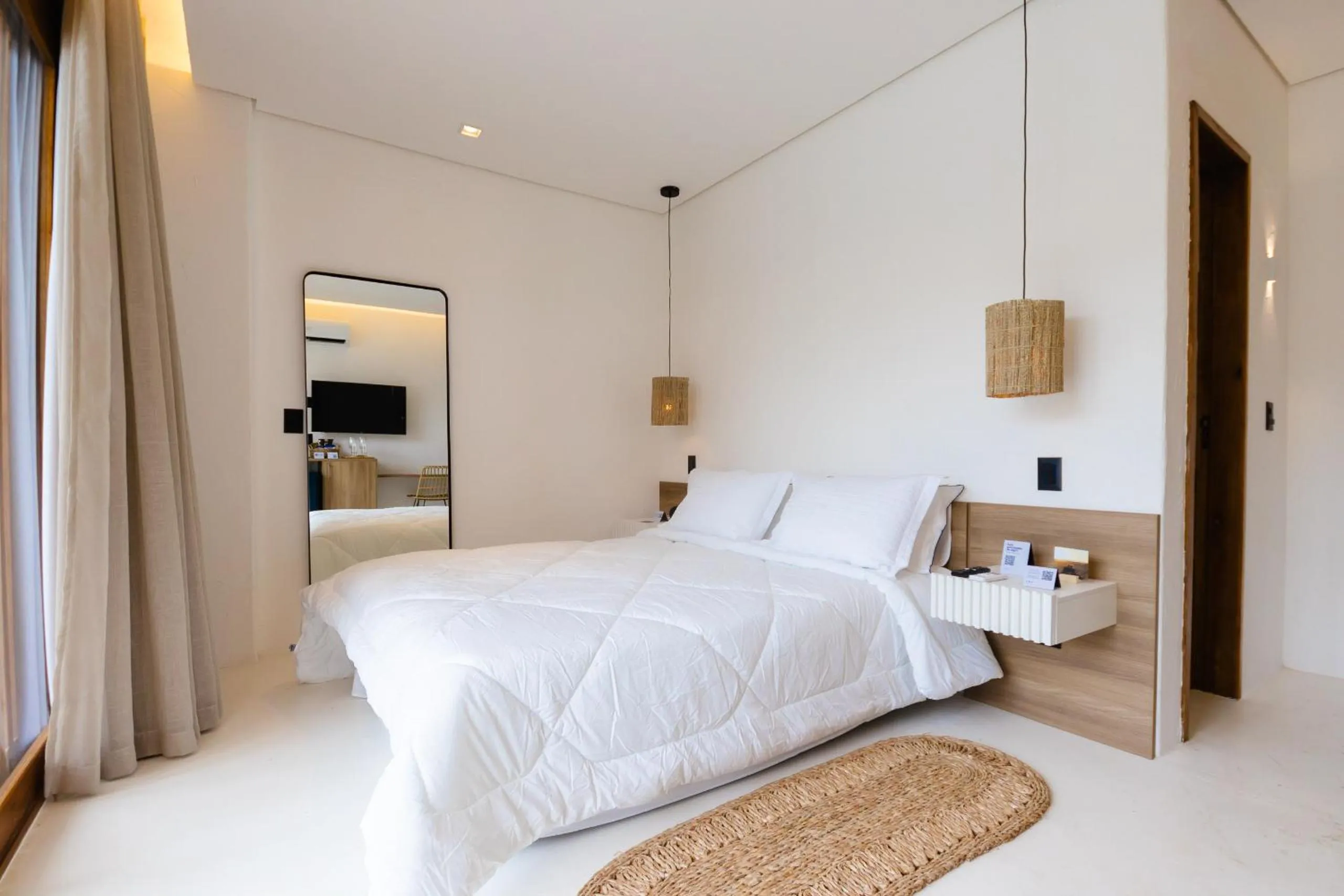 Bed in Mikiki Lifestyle Hotel