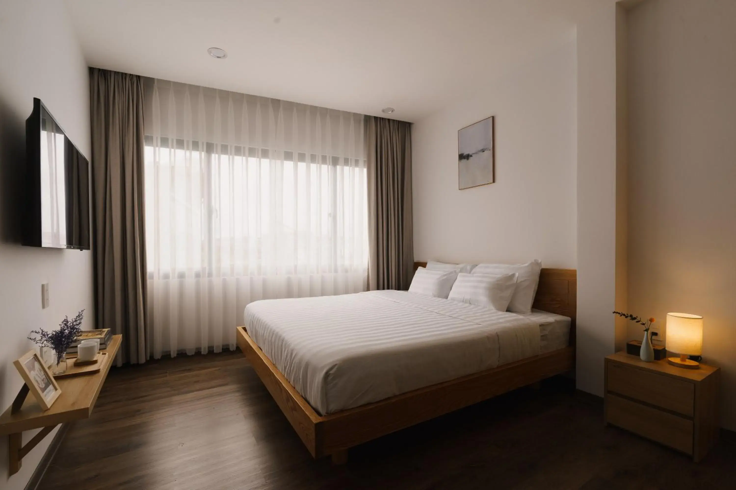 Bedroom in LATA Hotel & Apartments Bedroom in LATA Hotel & Apartments