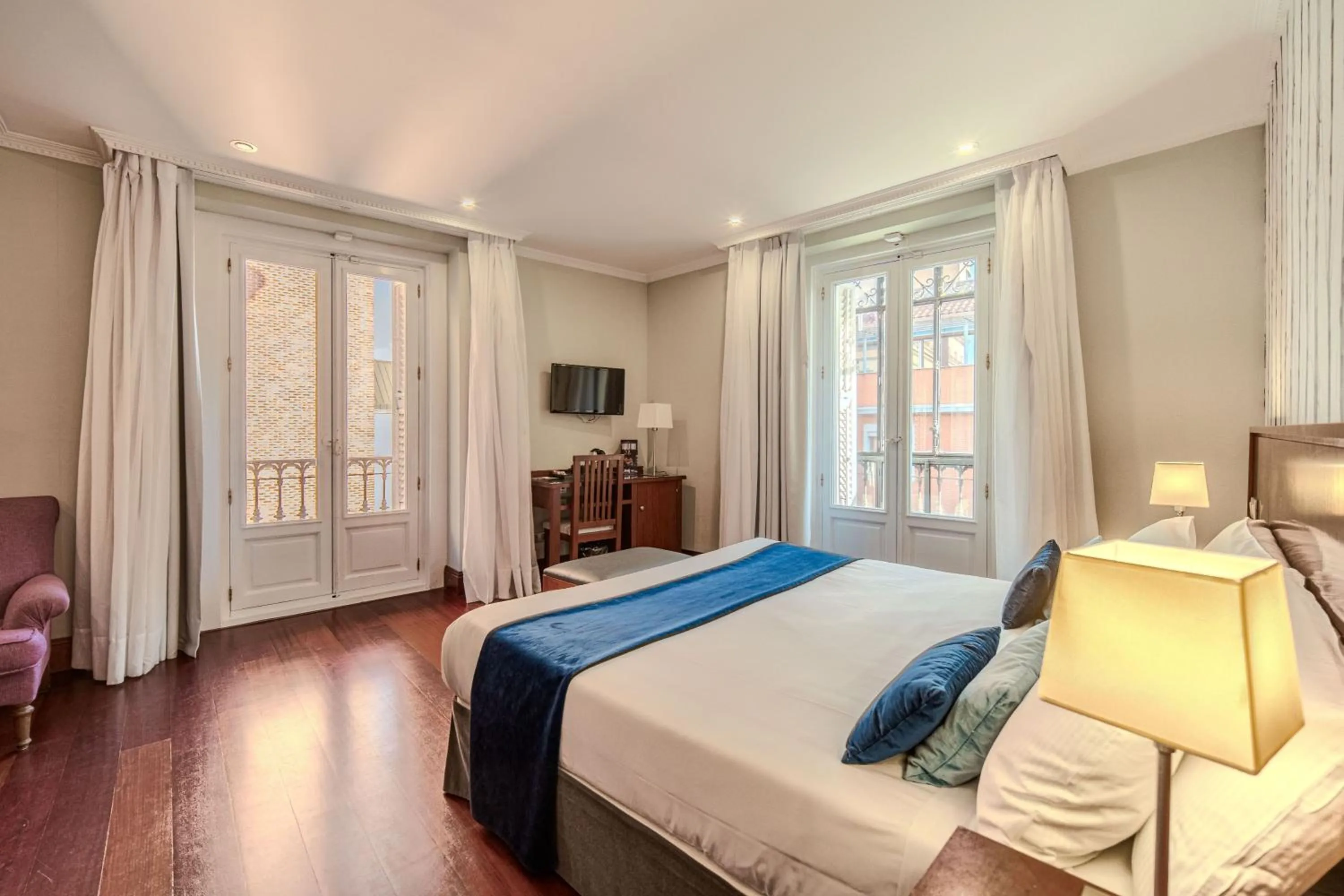 Photo of the whole room, Bed in ITC Infantas by Soho Boutique