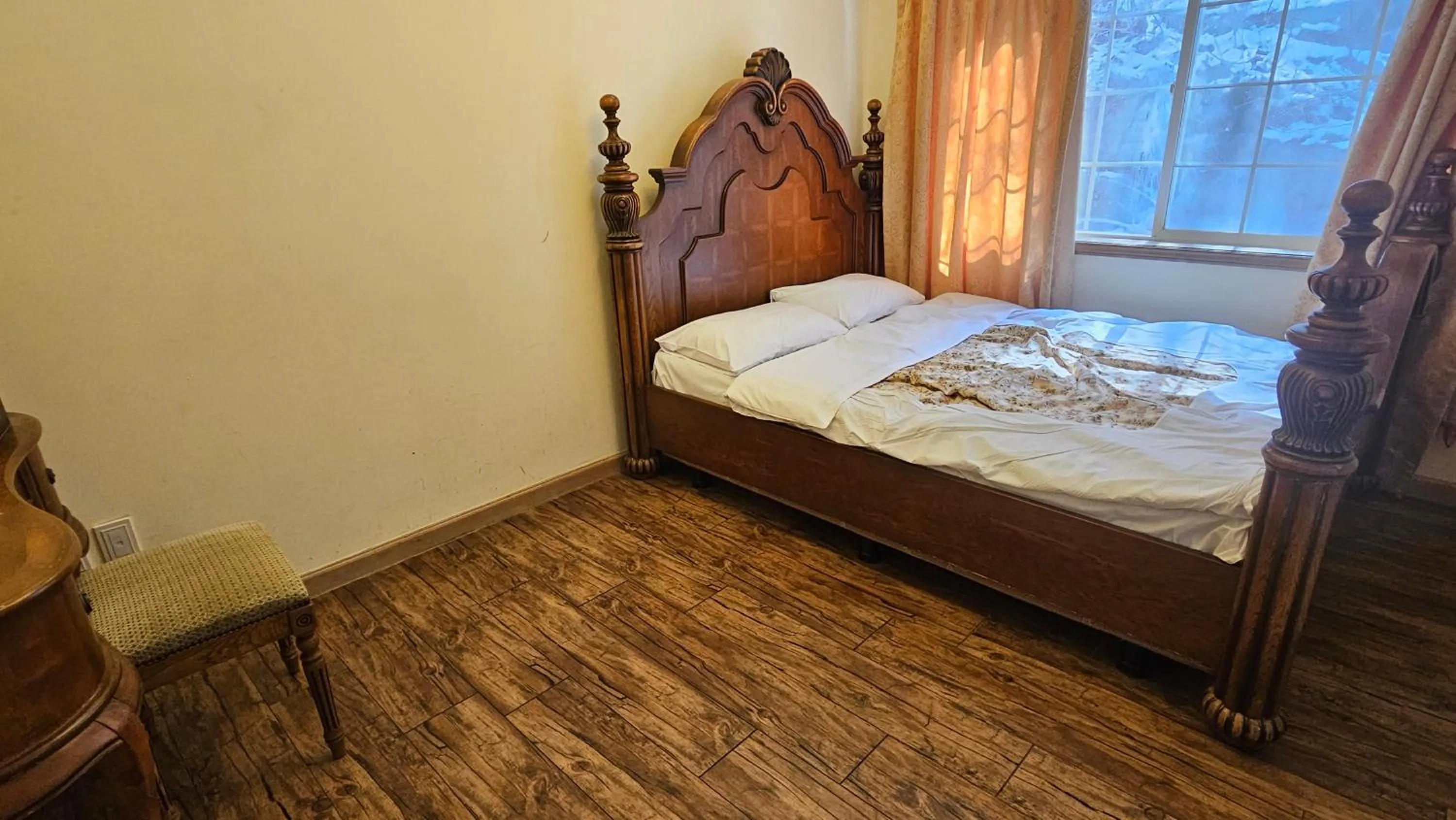 Bed in Elf Resort Hotel