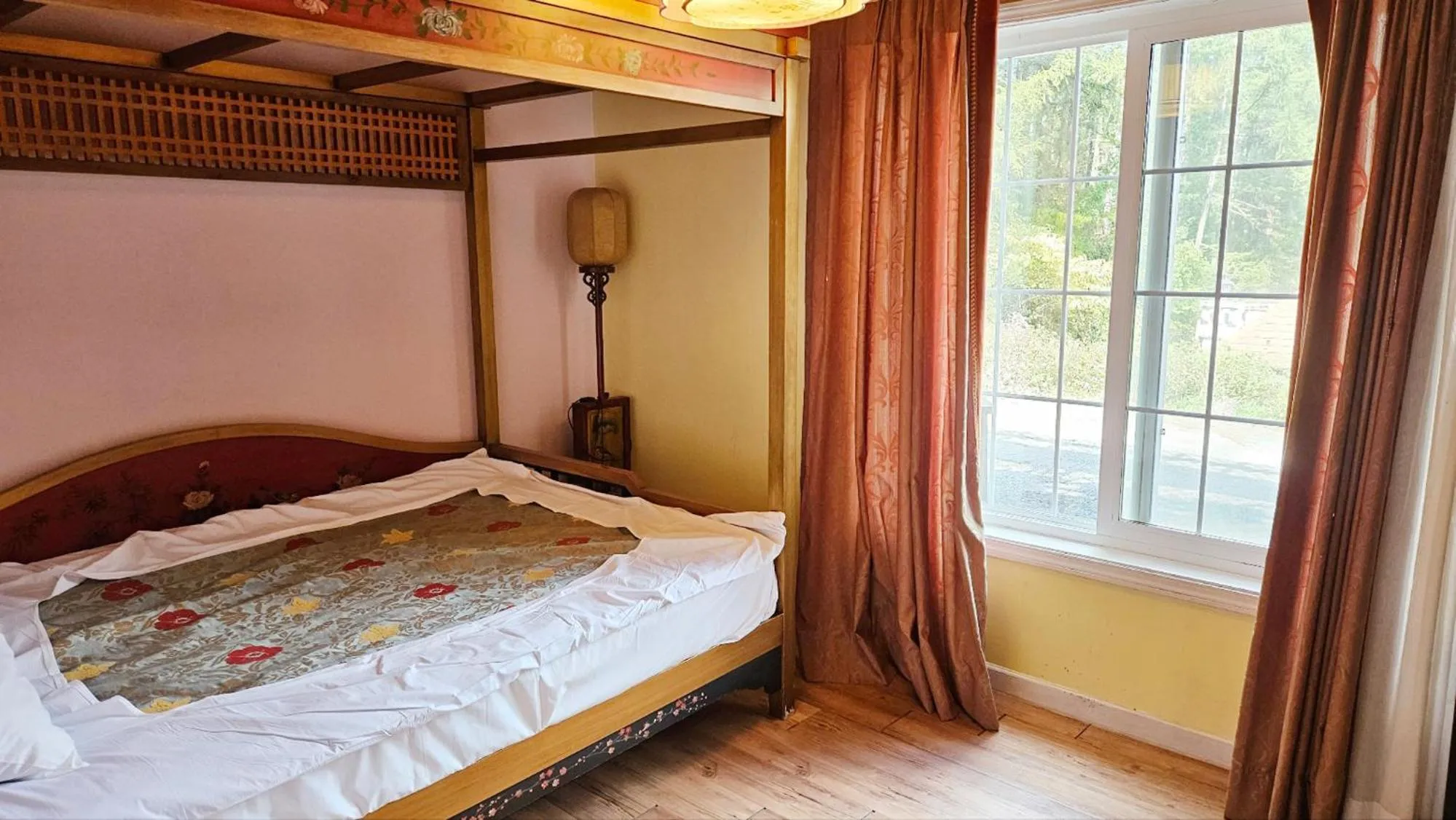 Bed in Elf Resort Hotel