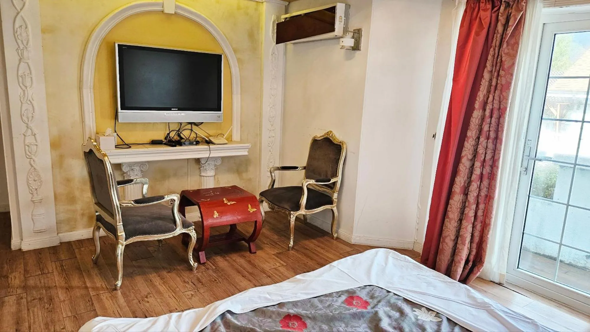 Bed in Elf Resort Hotel