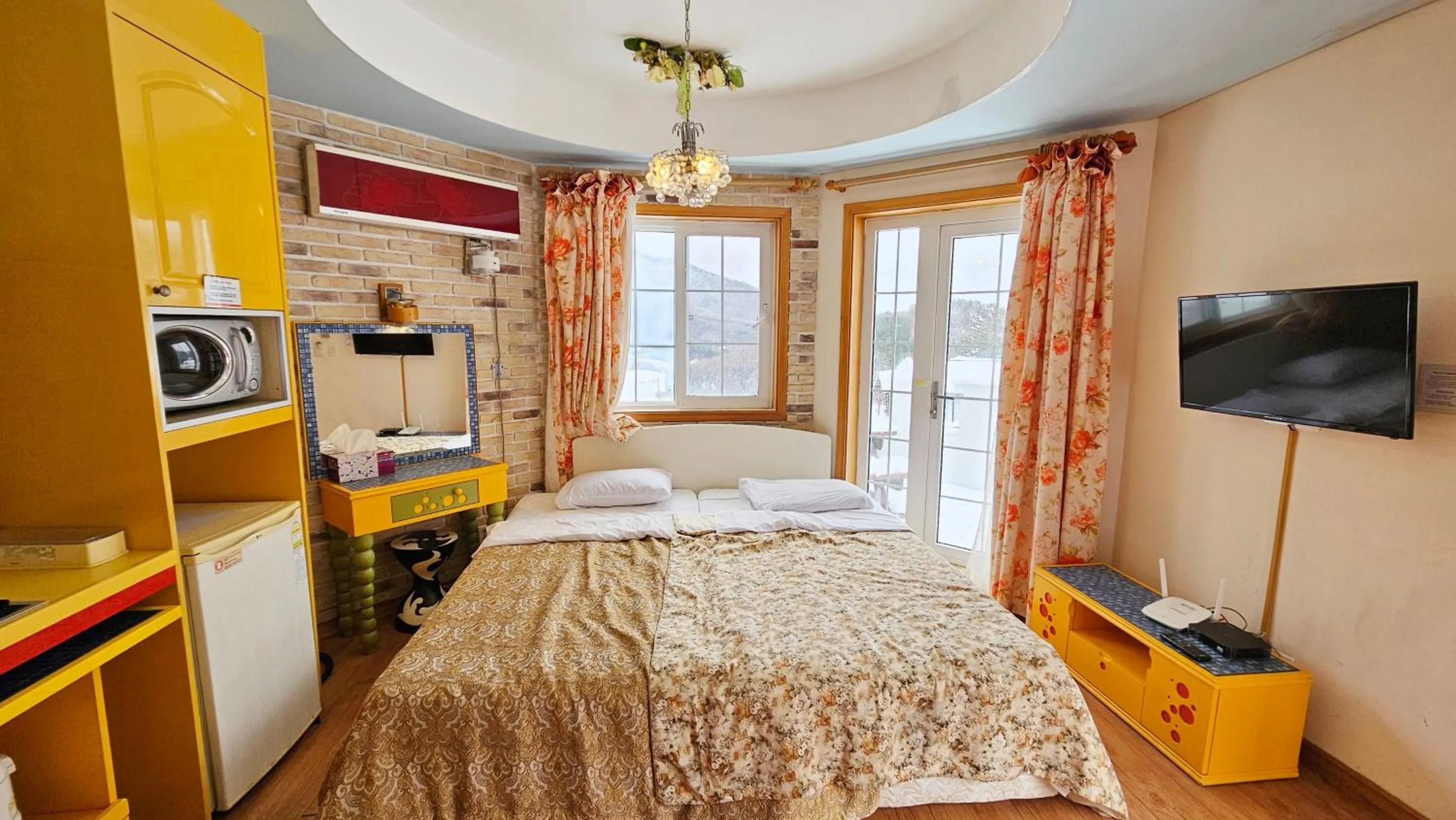 Bed in Elf Resort Hotel