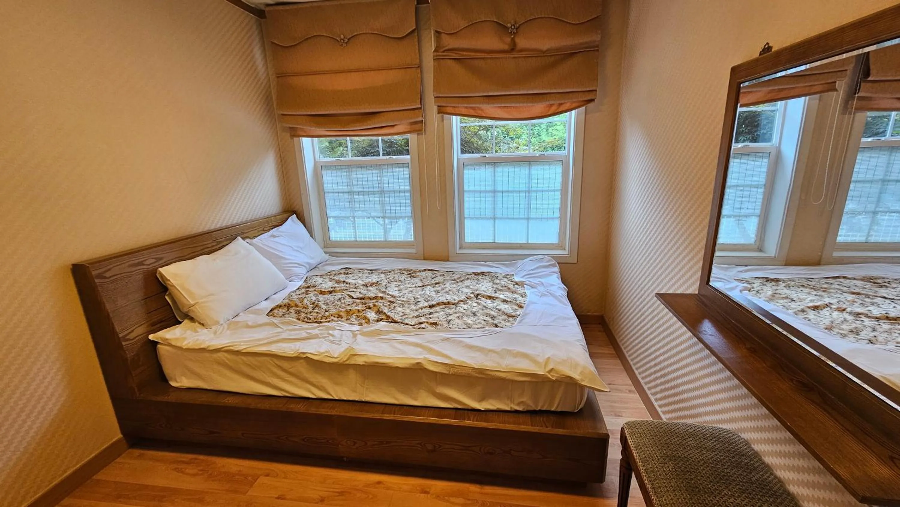 Bed in Elf Resort Hotel