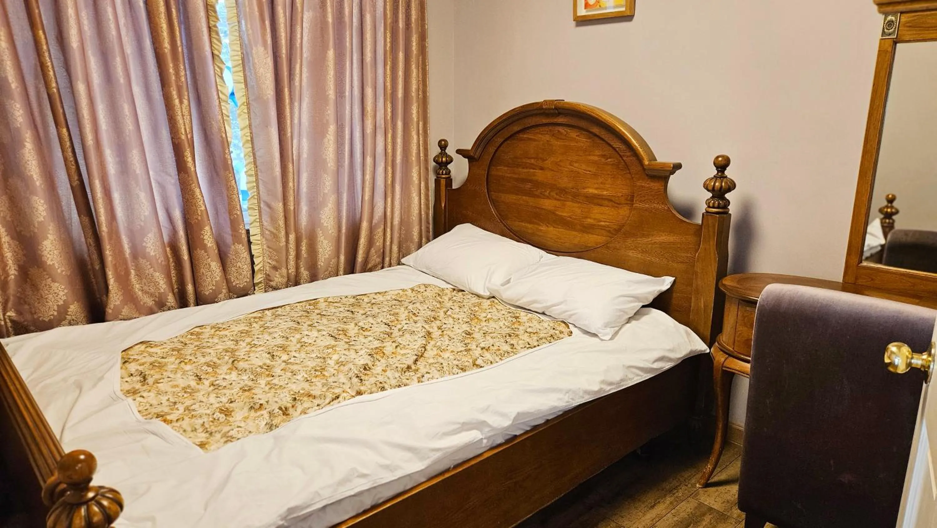 Bed in Elf Resort Hotel