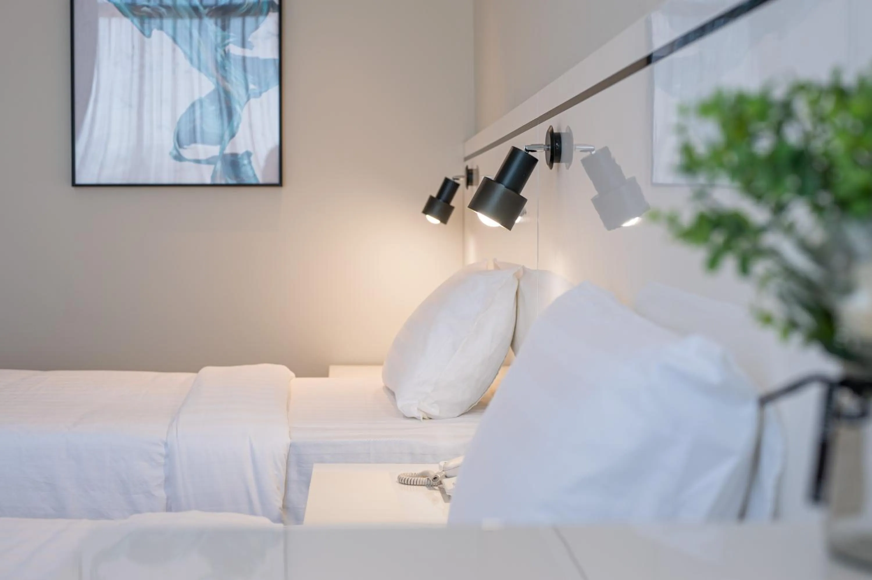 Bed in Grace Samudera Hotel