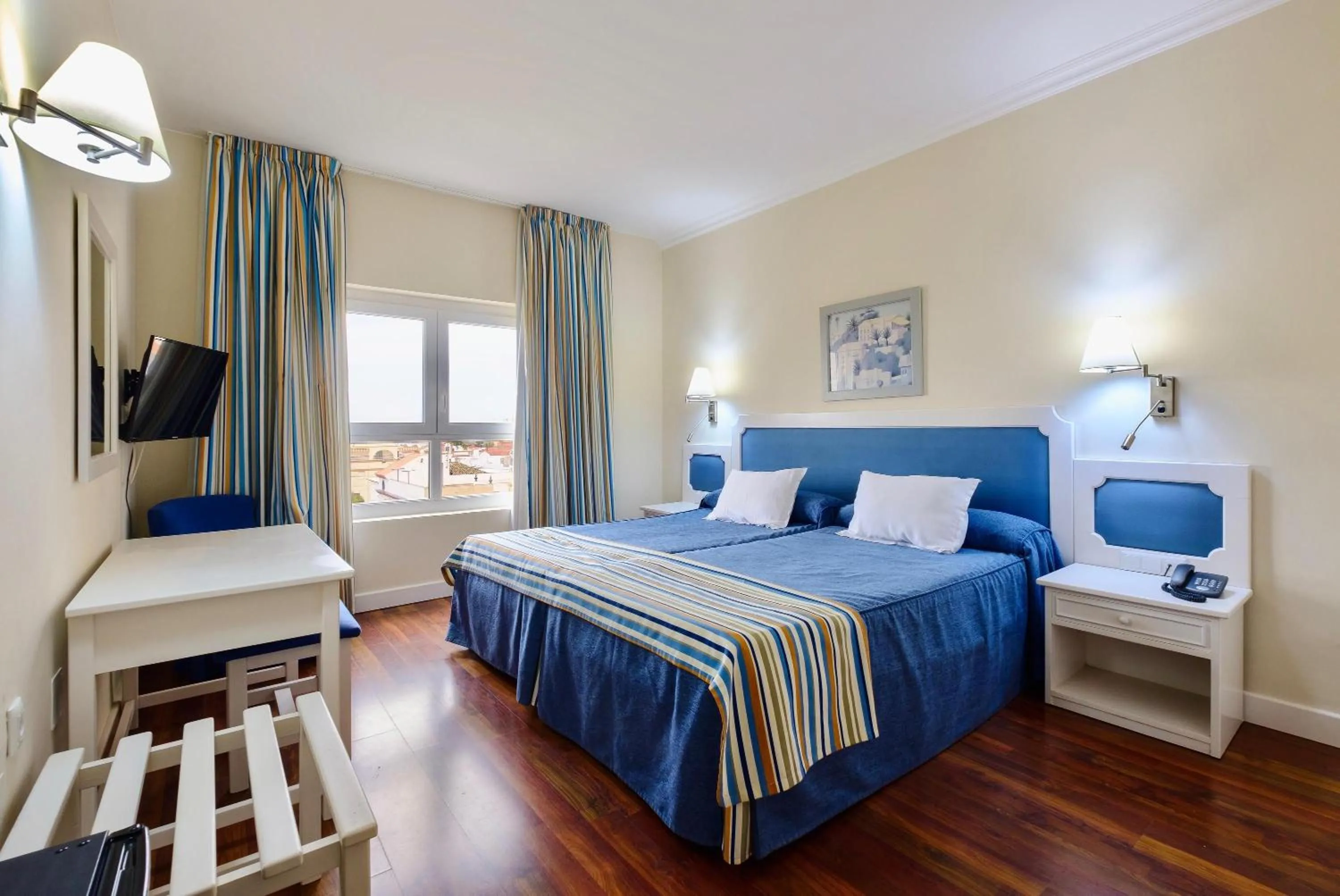 Bed in Hotel Guadalquivir