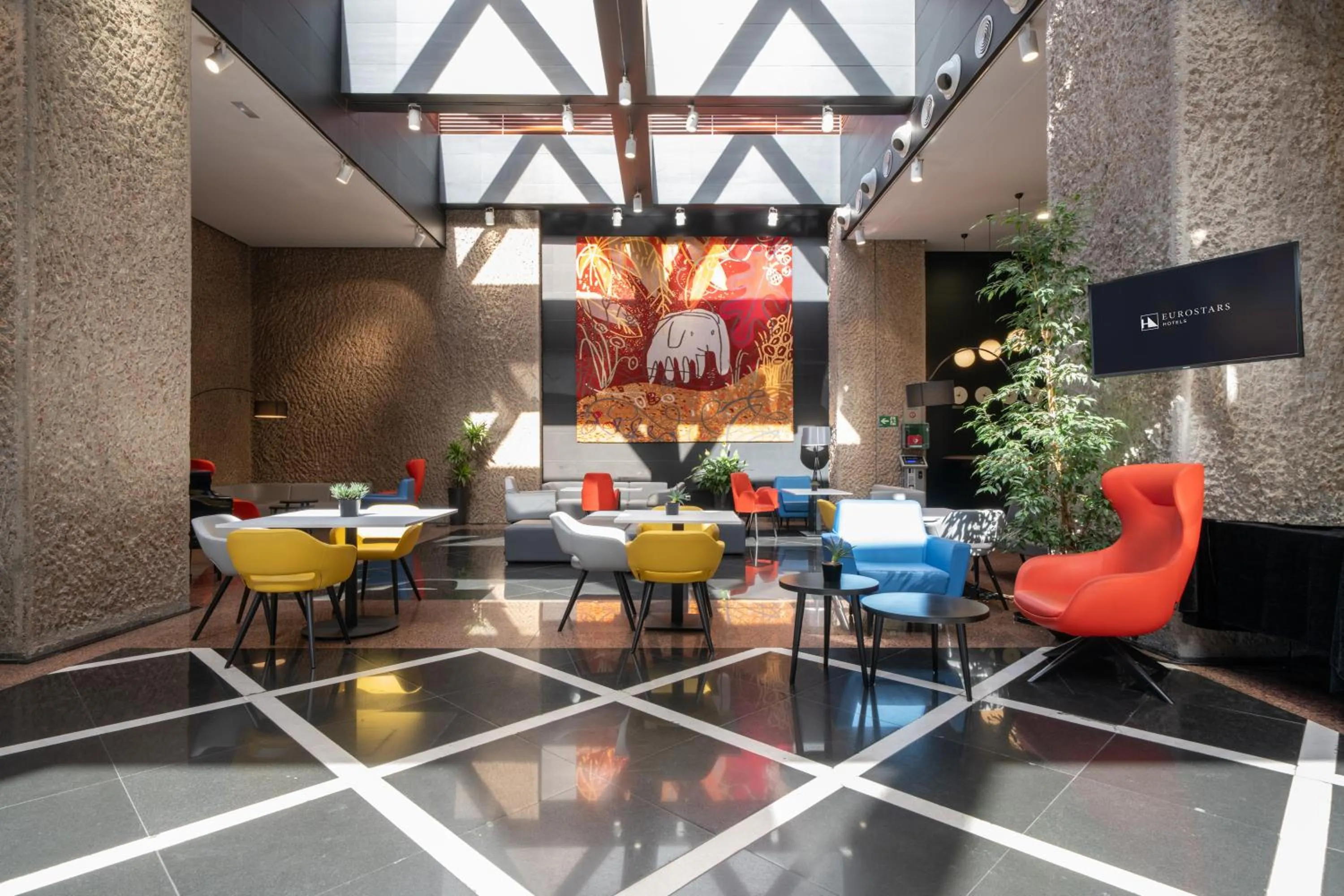 Lobby or reception in Eurostars Puerta Madrid