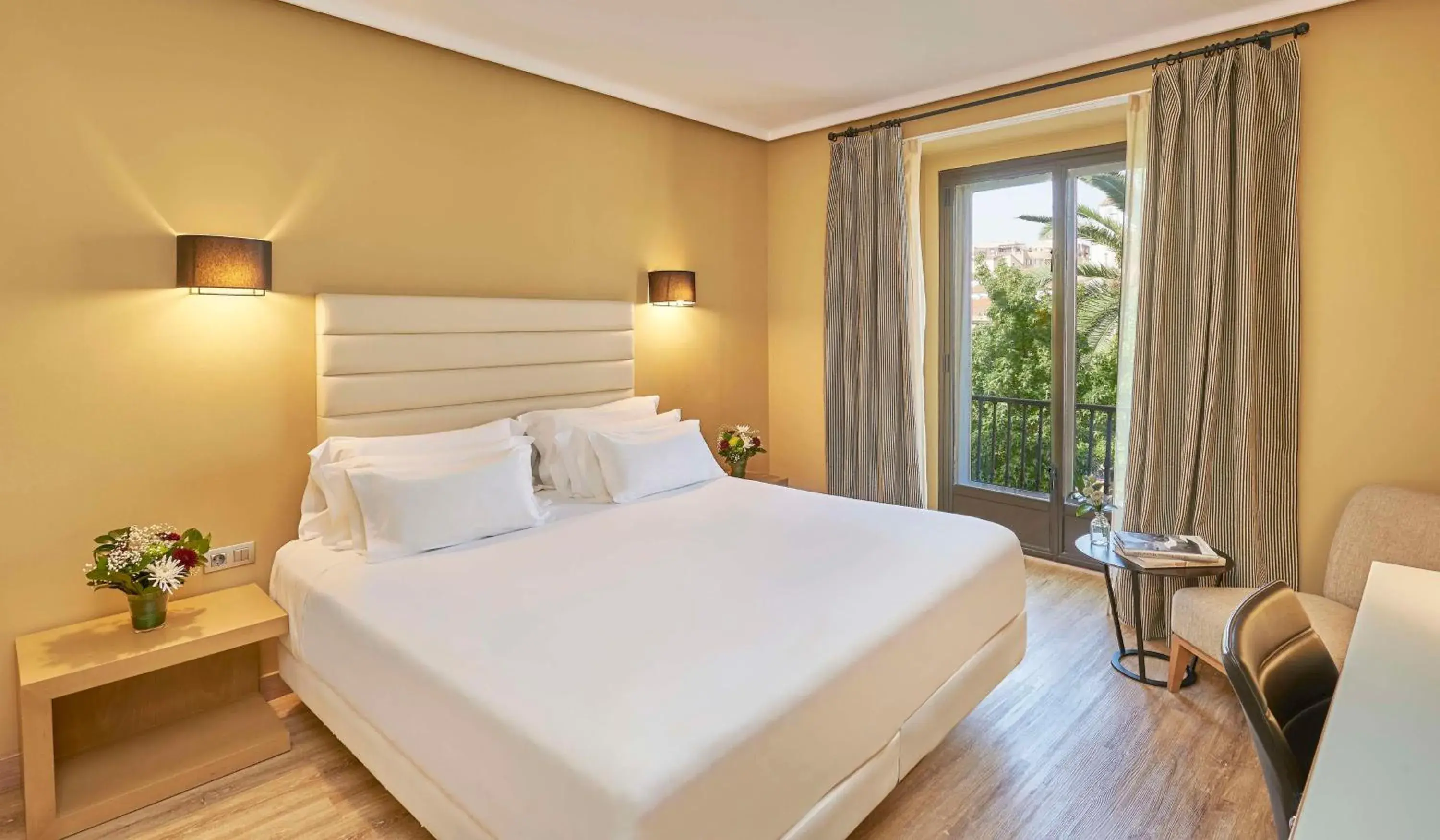 Photo of the whole room, Bed in NH Collection Cáceres Palacio de Oquendo Photo of the whole room, Bed in NH Collection Cáceres Palacio de Oquendo