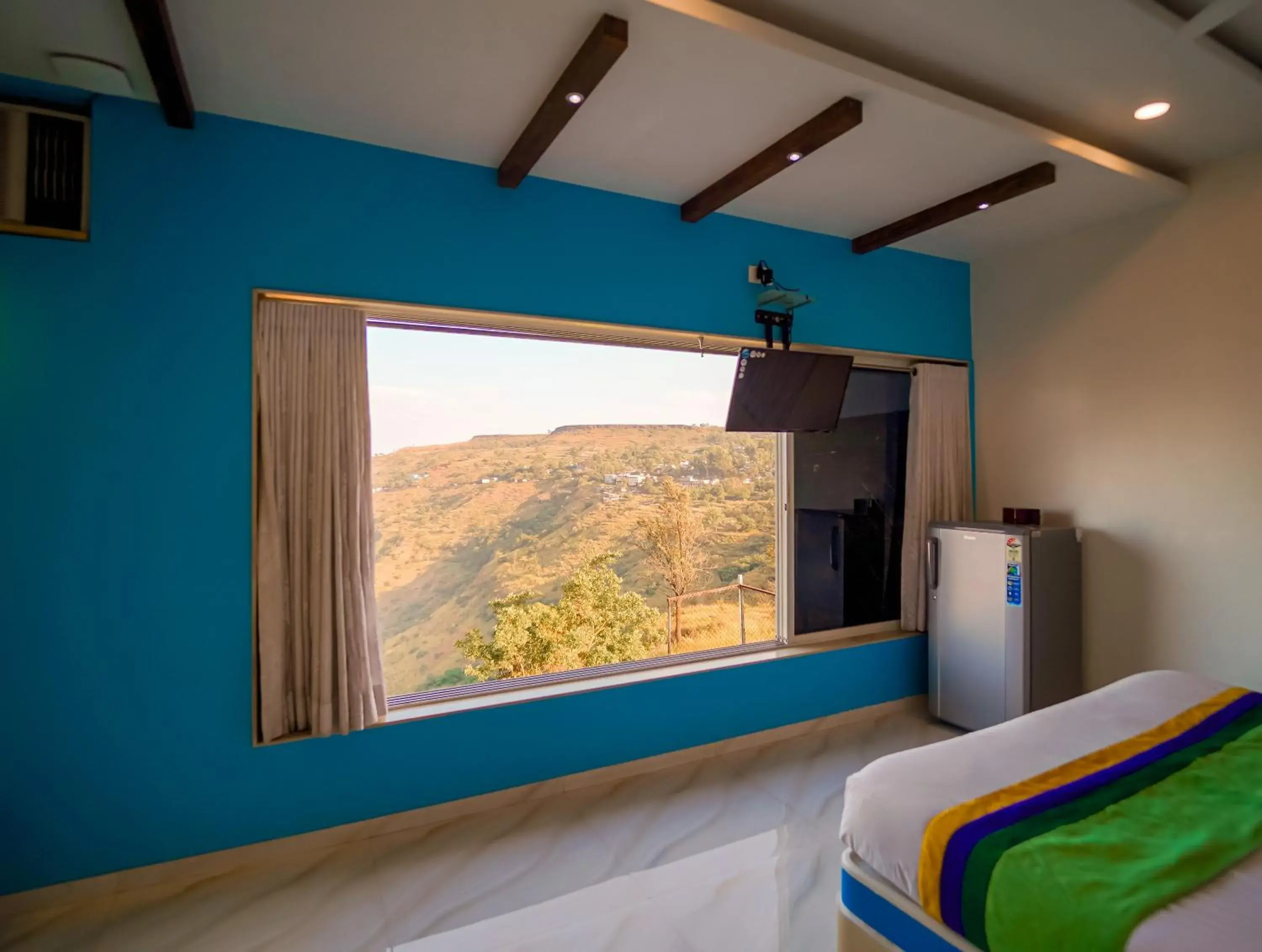 Bedroom in Treebo Raval Resort with Valley View Bedroom in Treebo Raval Resort with Valley View