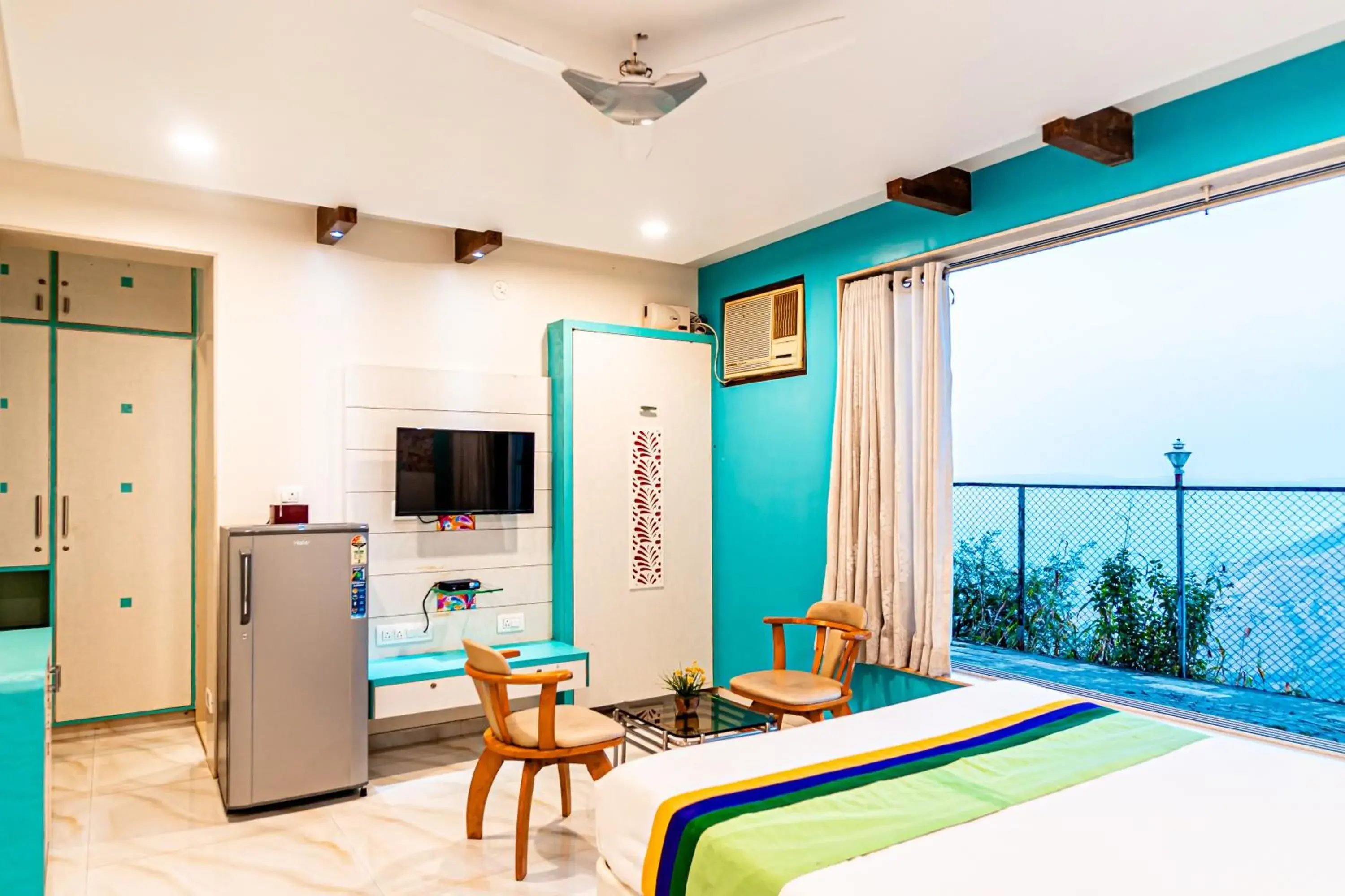 Bedroom in Treebo Raval Resort with Valley View Bedroom in Treebo Raval Resort with Valley View