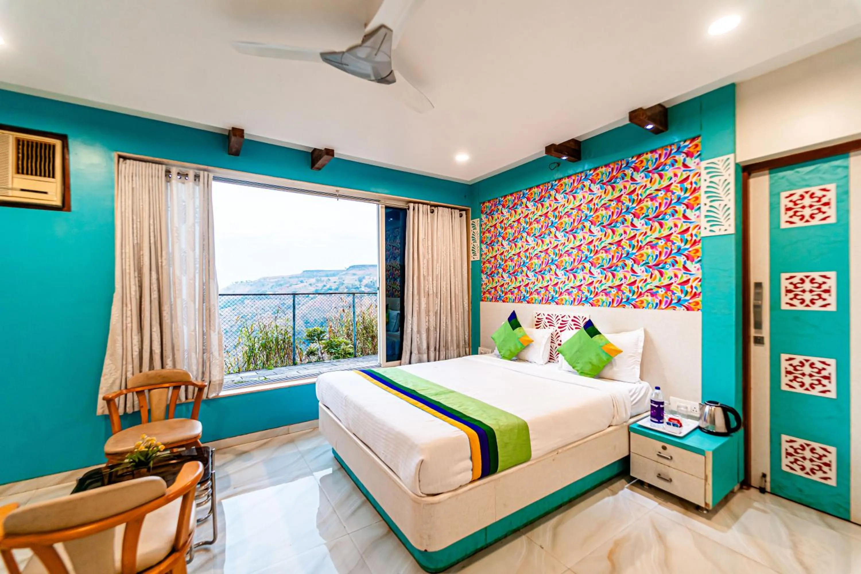 Bedroom in Treebo Raval Resort with Valley View