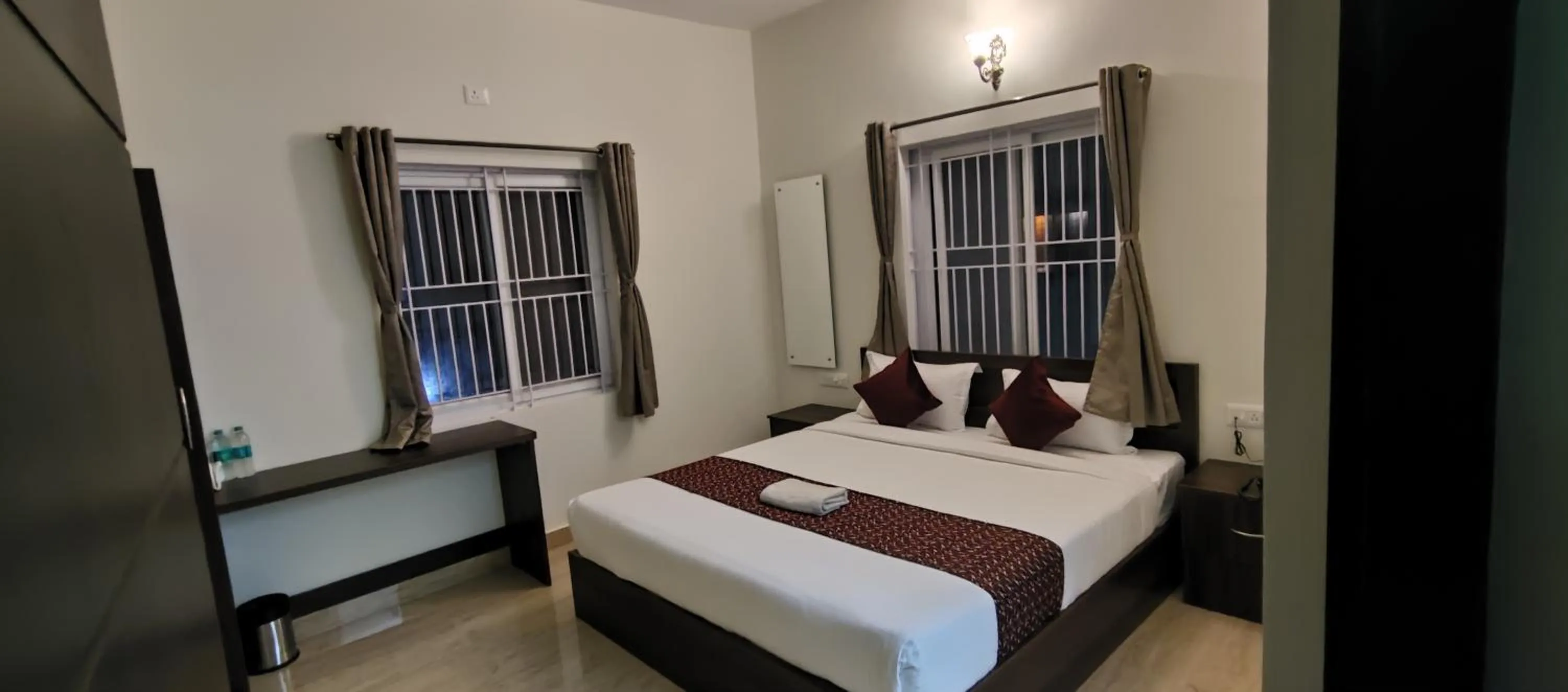 Photo of the whole room, Bed in Hotel Bangalore Airport Inn, Near kempegowda Airport, Airport Pickup & Drop Available 24X7