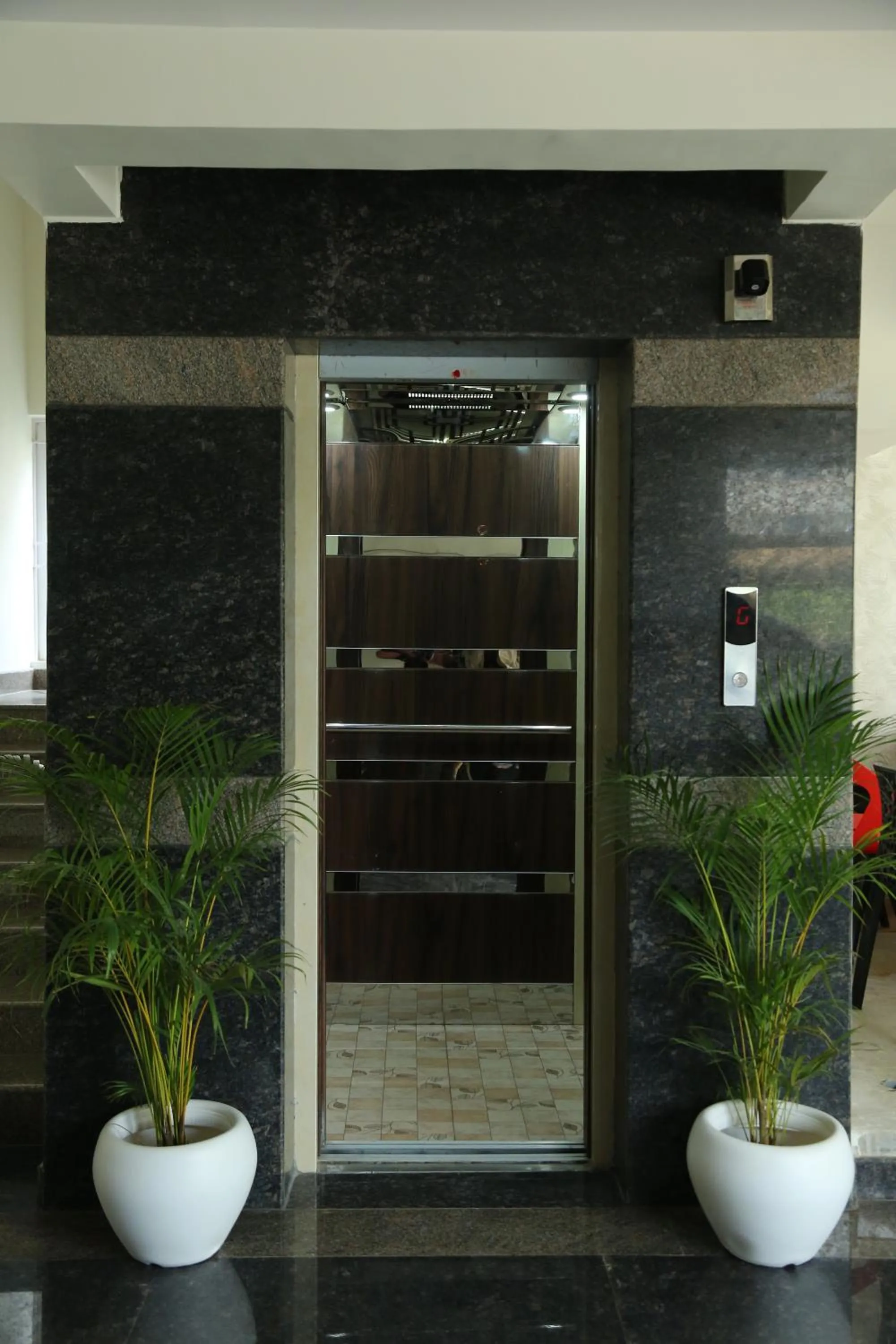 elevator in Hotel Bangalore Airport Inn, Near kempegowda Airport, Airport Pickup & Drop Available 24X7