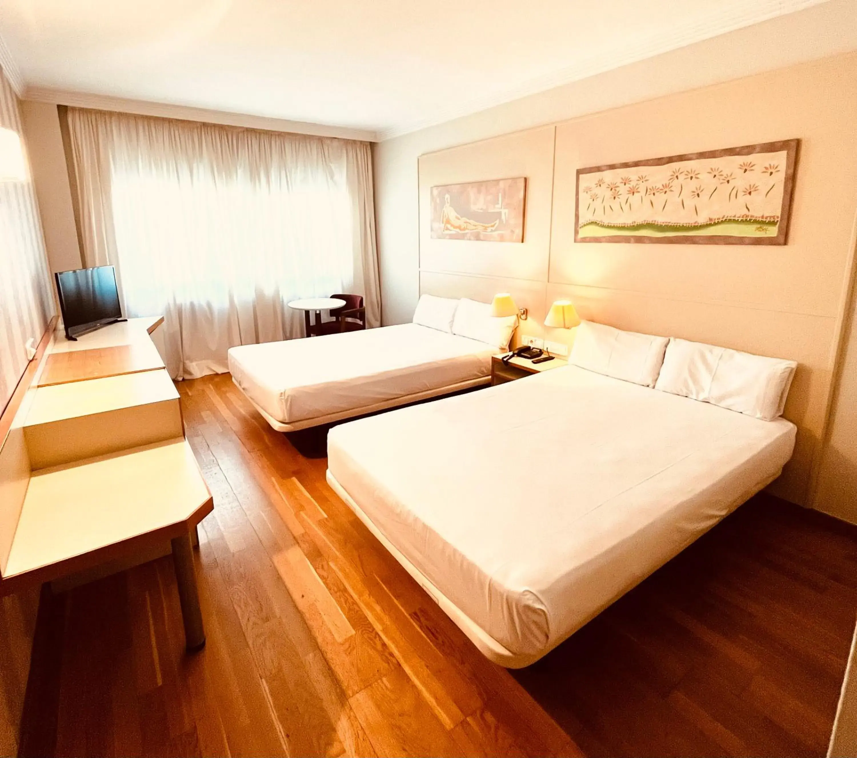 Family Room (2 Adults + 2 Children) in Hotel Urpí Family Room (2 Adults + 2 Children) in Hotel Urpí