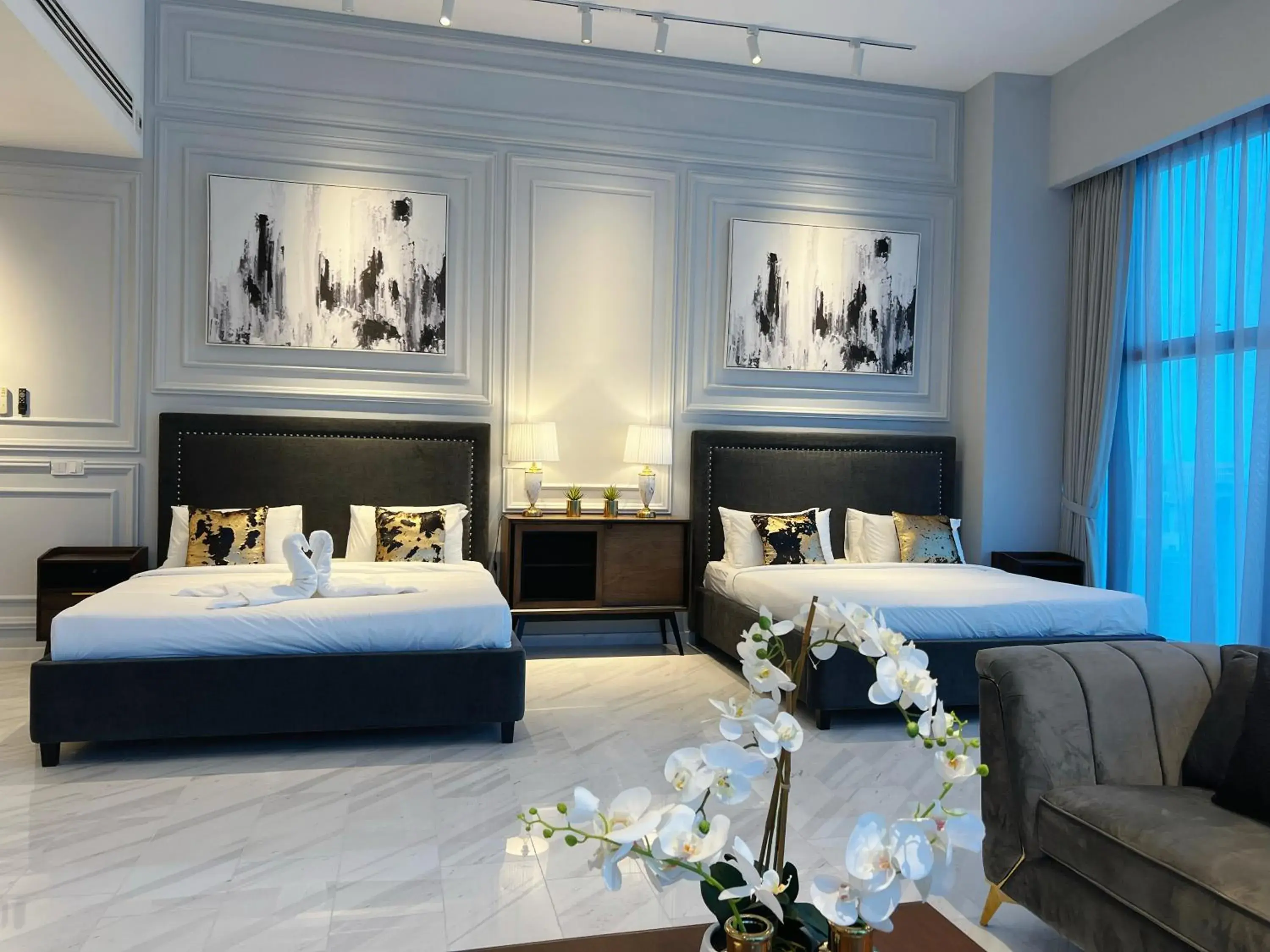 Luxury Quadruple Room in The Eaton Residences by Times 8 Luxury Quadruple Room in The Eaton Residences by Times 8