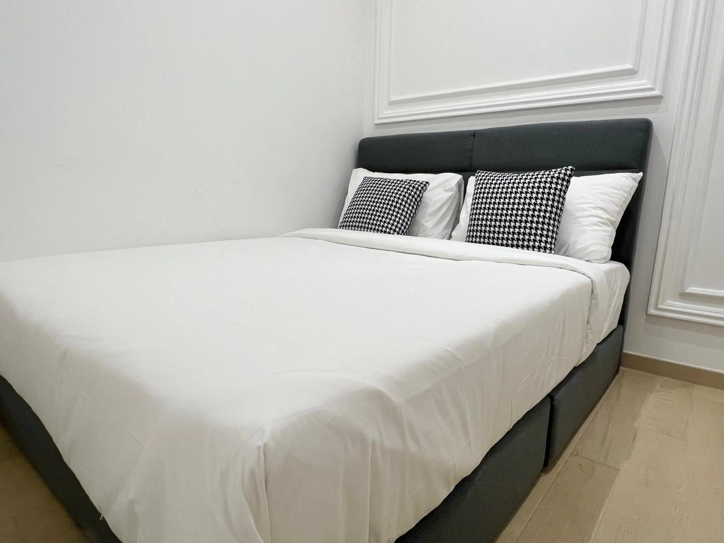 Bed in The Eaton Residences by Times 8