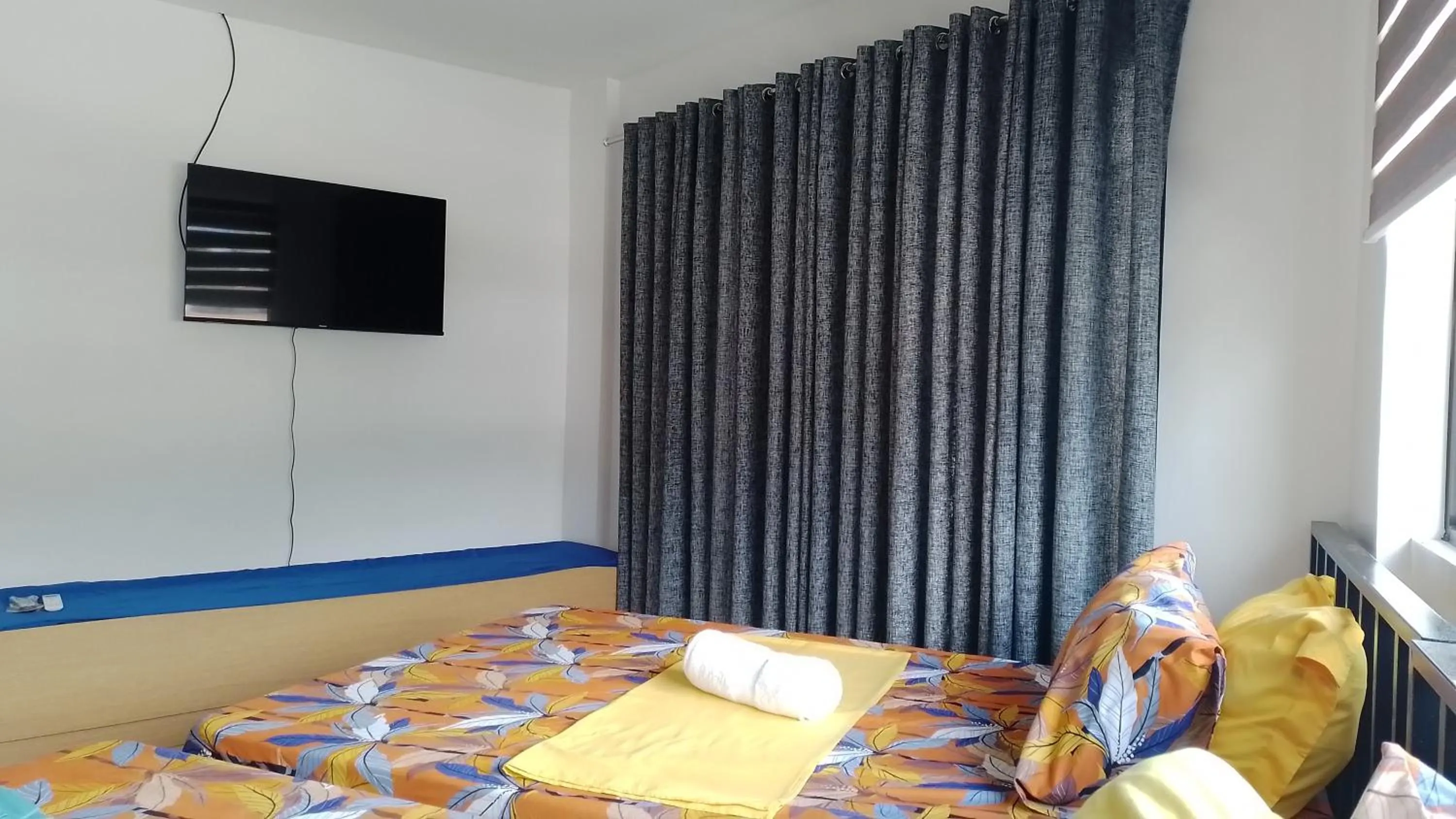 Bed in Maria Cristesa Condotel