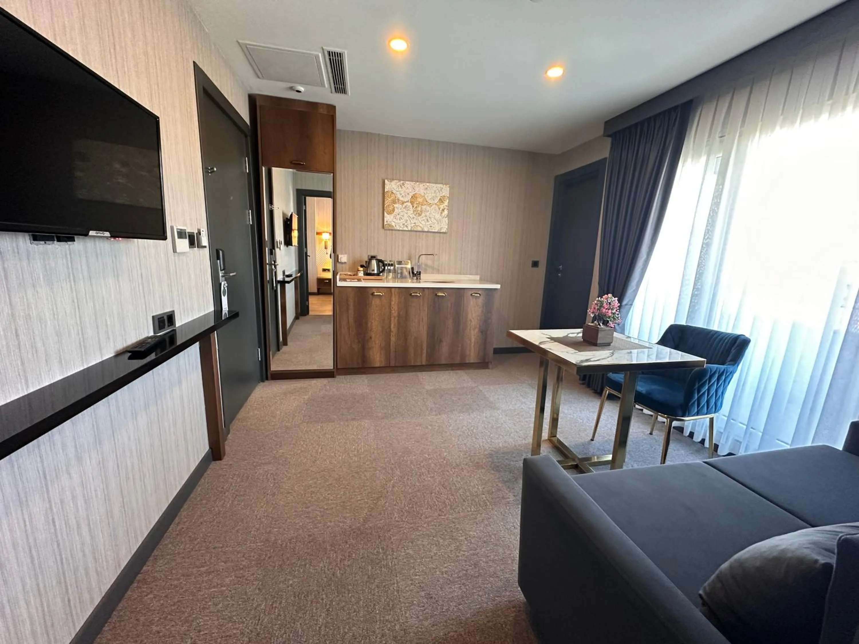 Photo of the whole room in Trademark Collection by Wyndham Operla Istanbul Airport Hotels