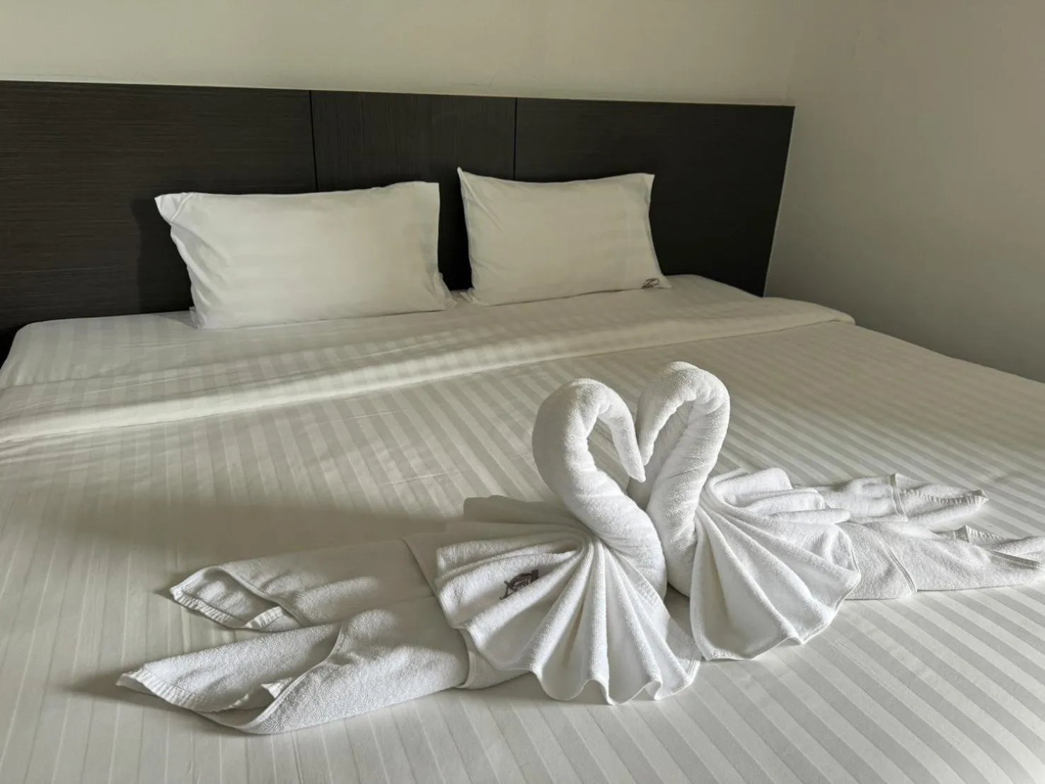 Bed in 77 Patong Hotel & Spa