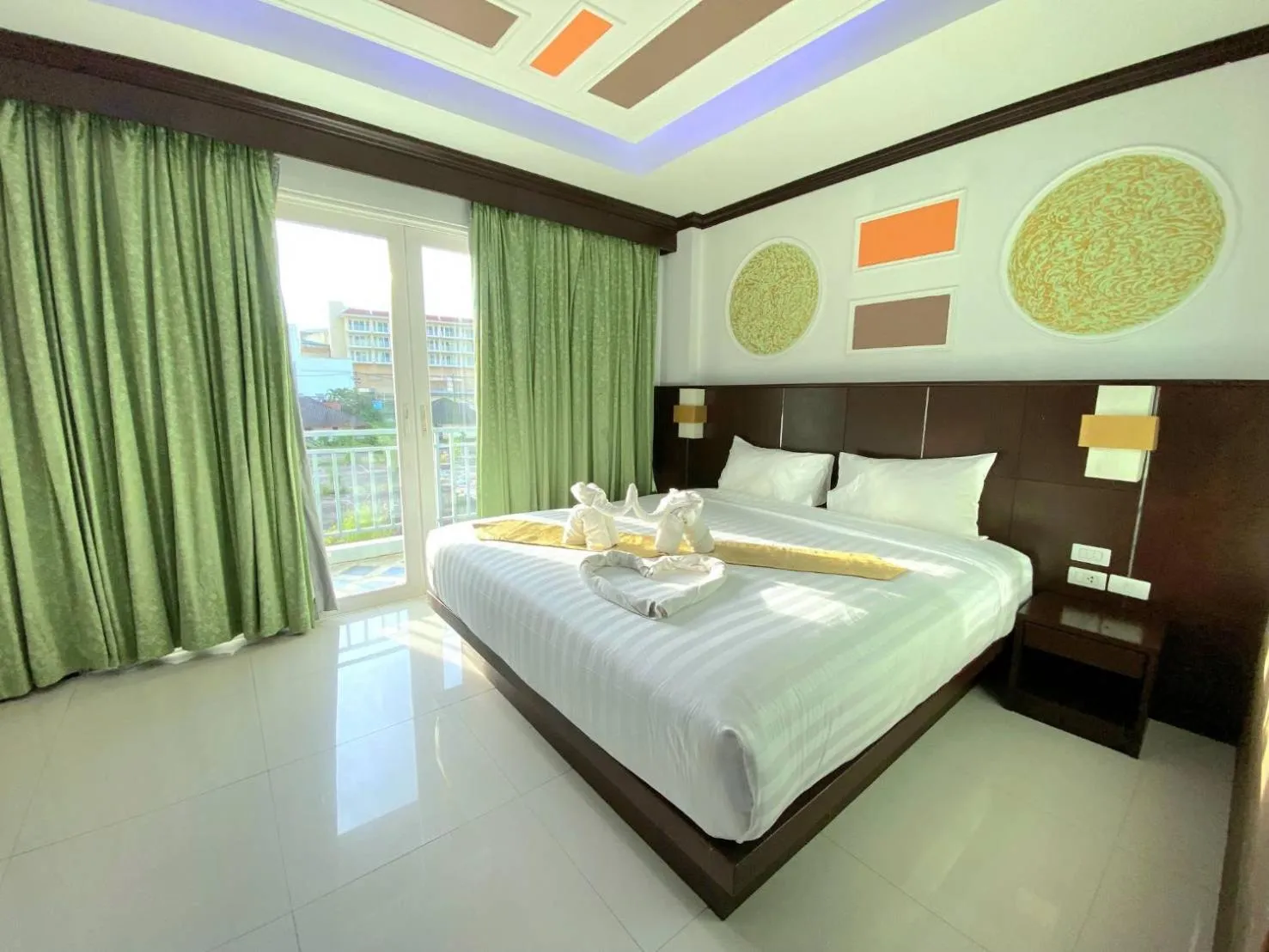 Bed in 77 Patong Hotel & Spa