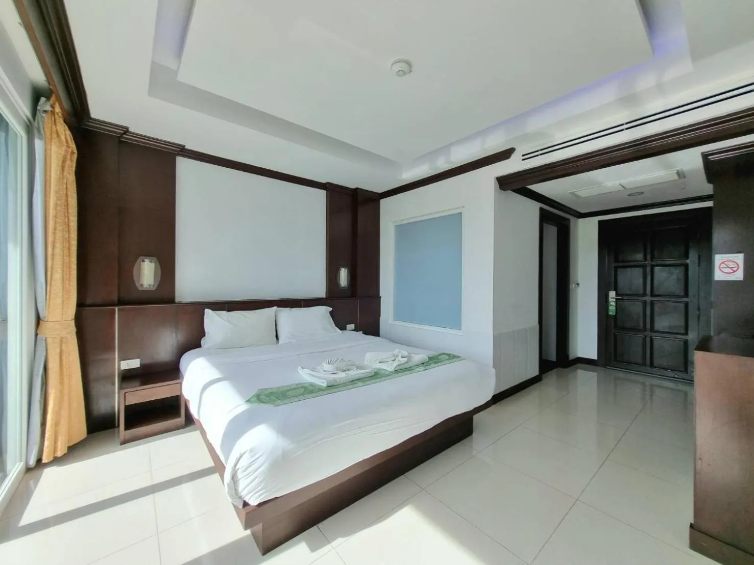 Bed in 77 Patong Hotel & Spa