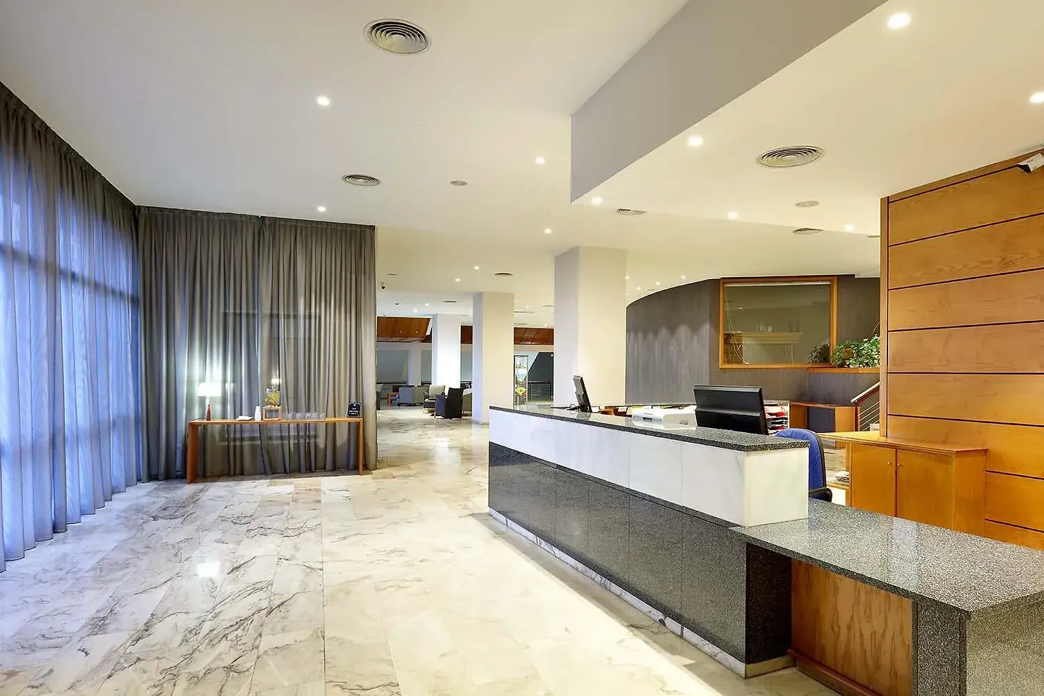 Lobby or reception in Exe Isla Cartuja Lobby or reception in Exe Isla Cartuja