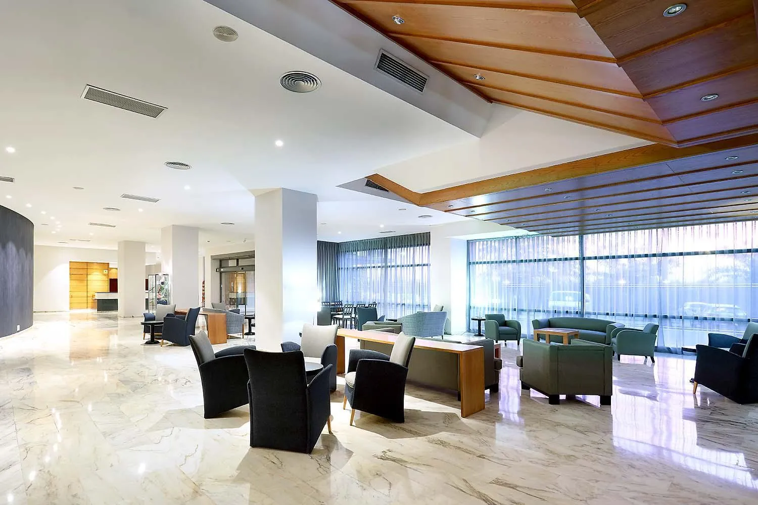 Communal lounge/ TV room in Exe Isla Cartuja