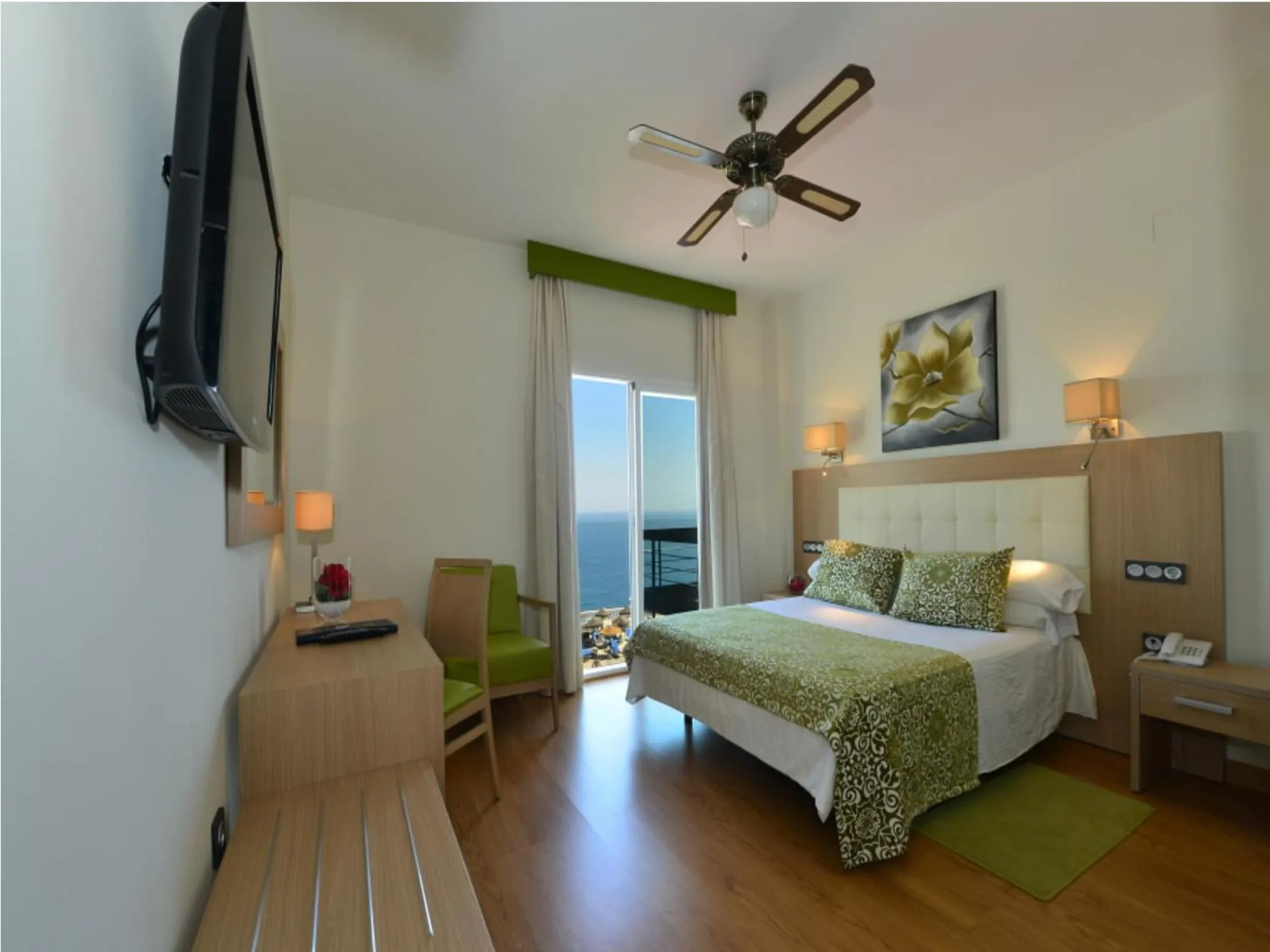 Bed in Hotel Salobreña Suites