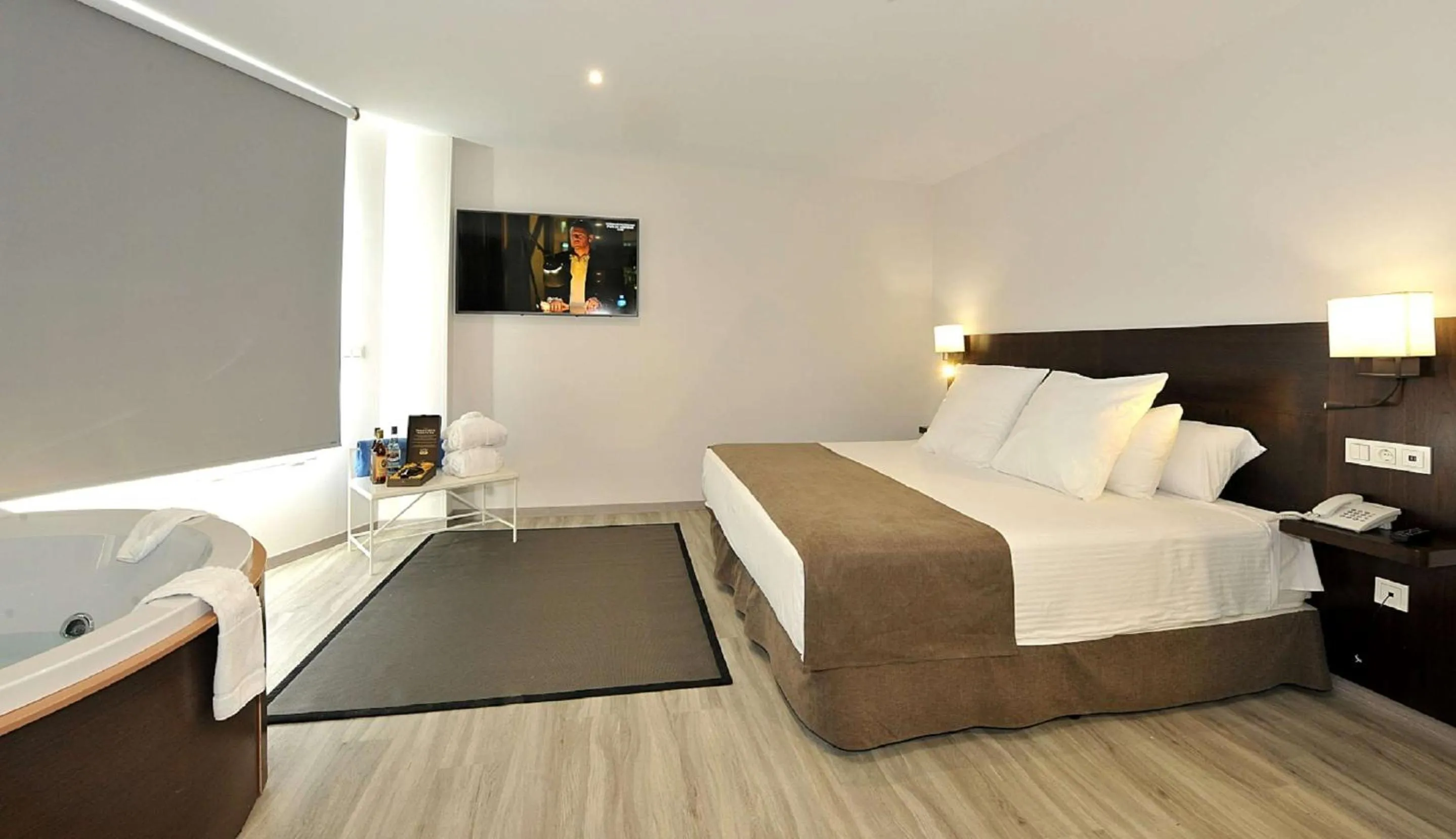 Photo of the whole room, Bed in Hotel Salobreña Suites