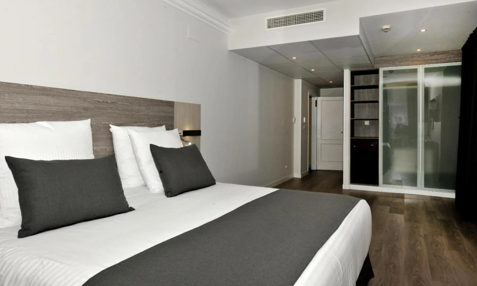 Bed in Hotel Salobreña Suites