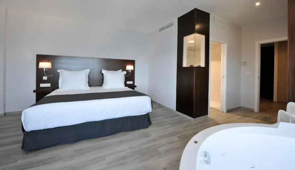 Bed in Hotel Salobreña Suites Bed in Hotel Salobreña Suites