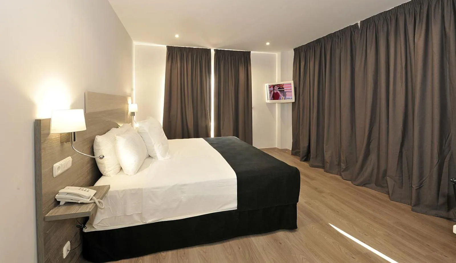 Bed in Hotel Salobreña Suites