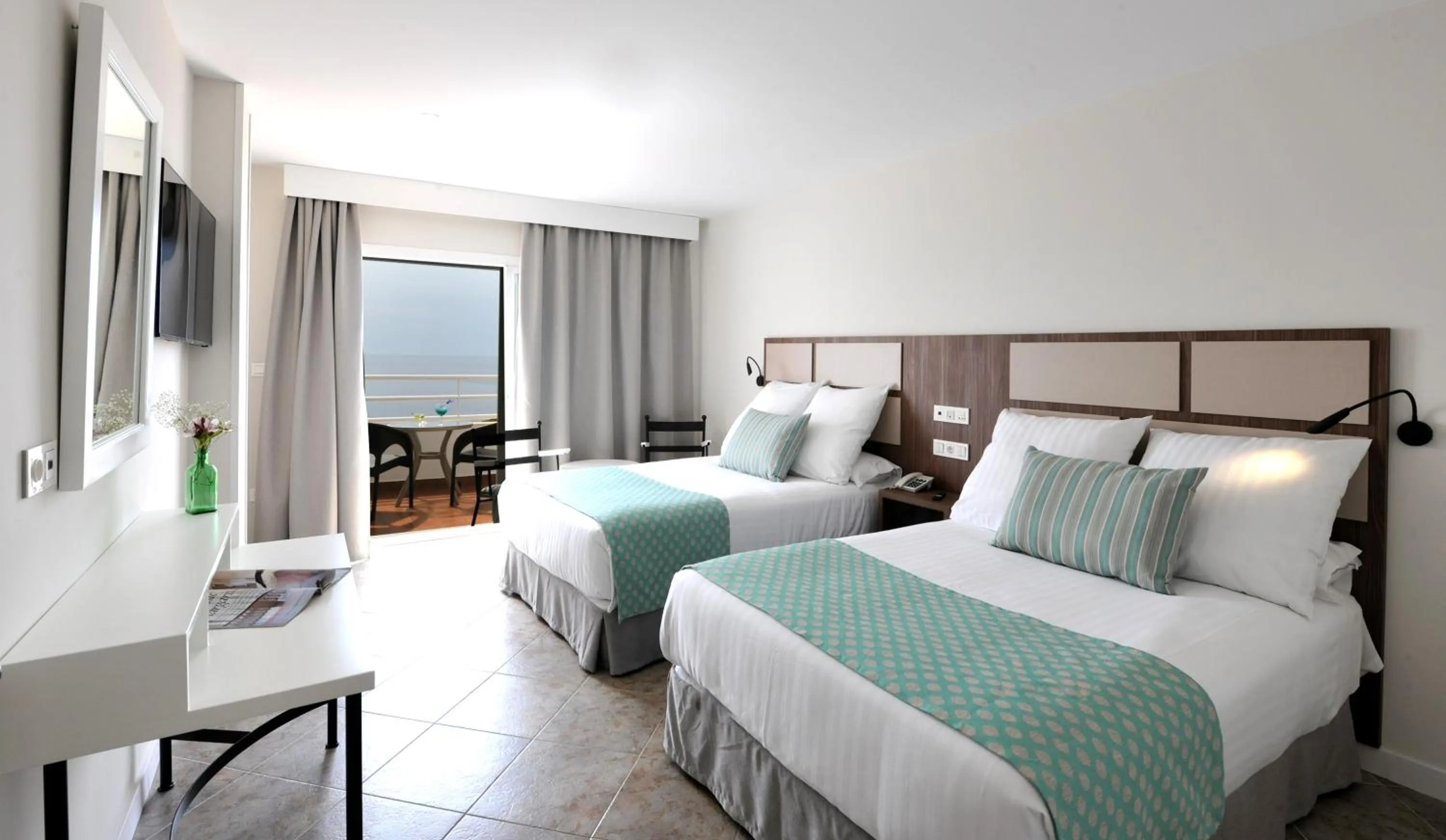 Bed in Hotel Salobreña Suites