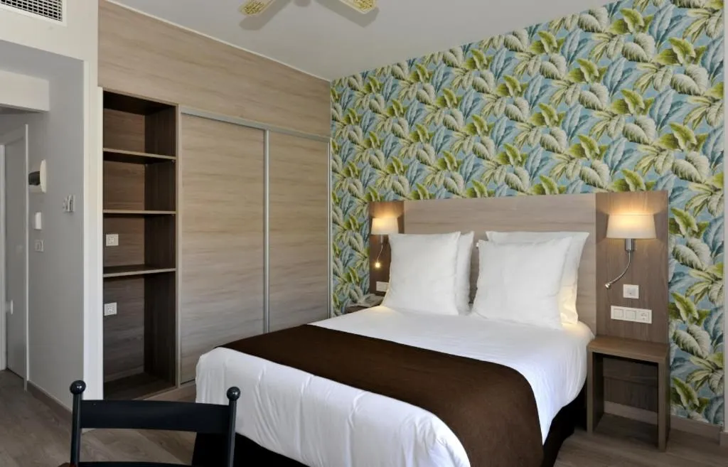 Bed in Hotel Salobreña Suites