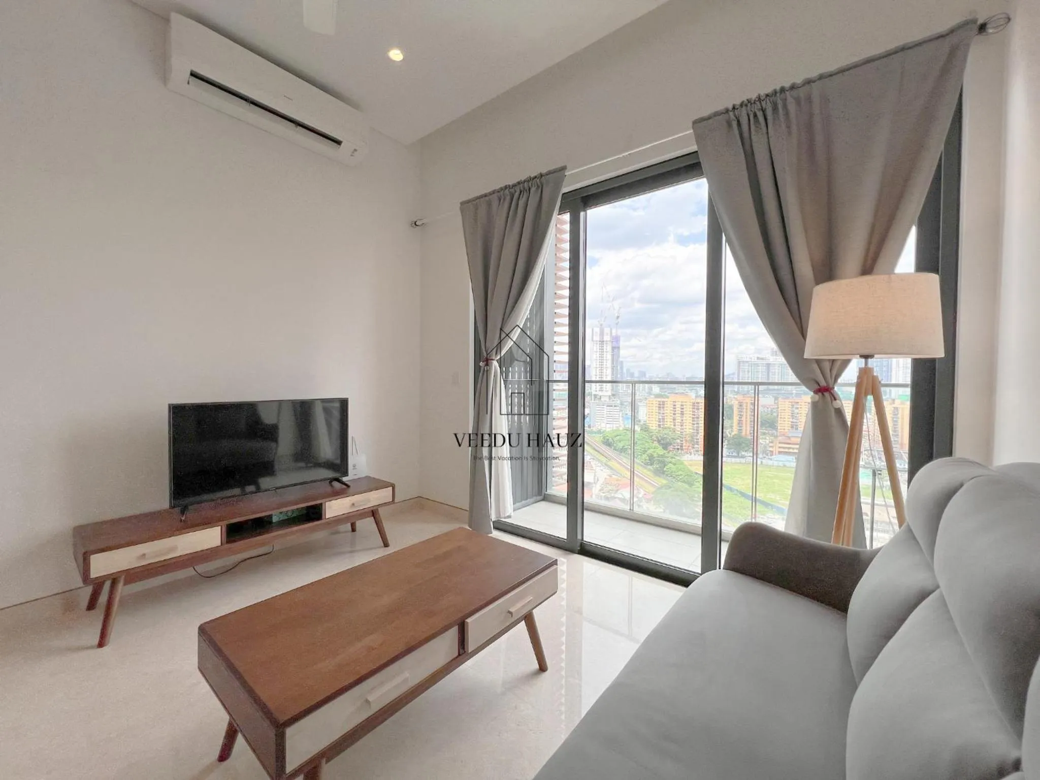 Living room in Lucentia Residences BBCC at Lalaport Kuala Lumpur by Veedu Hauz