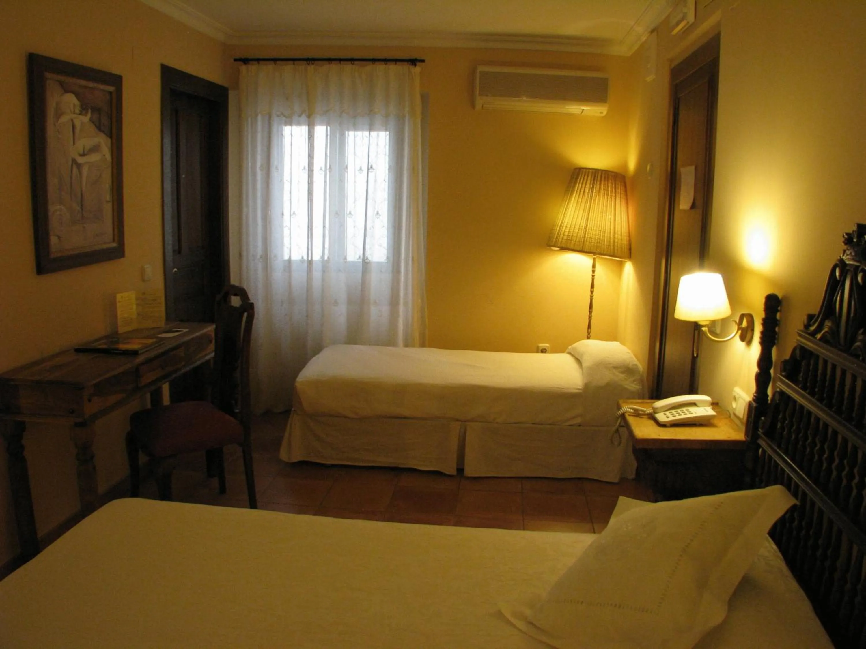 Photo of the whole room, Bed in Hotel Don Carlos Cáceres