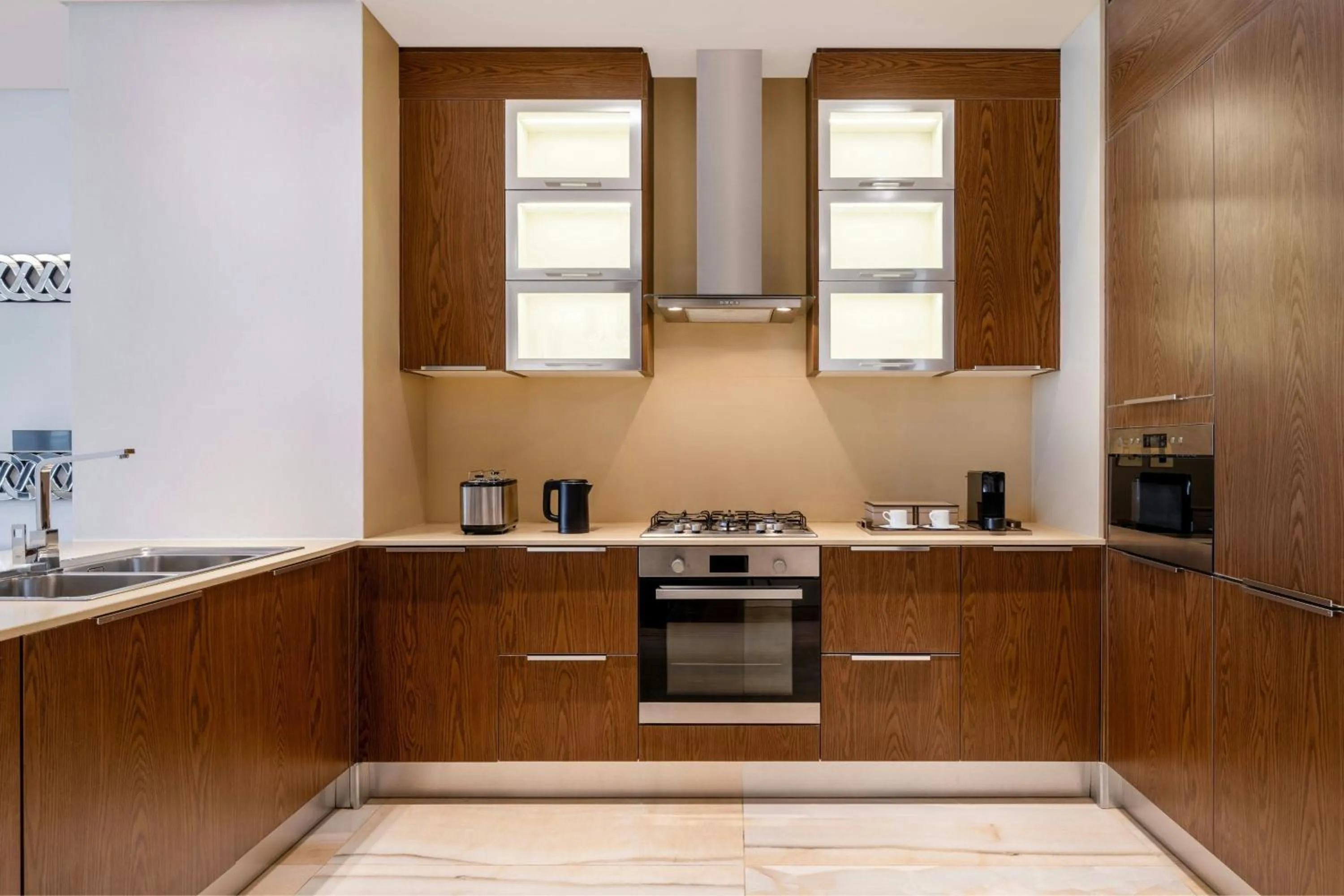 Kitchen or kitchenette in Agora, Doha, Autograph Collection
