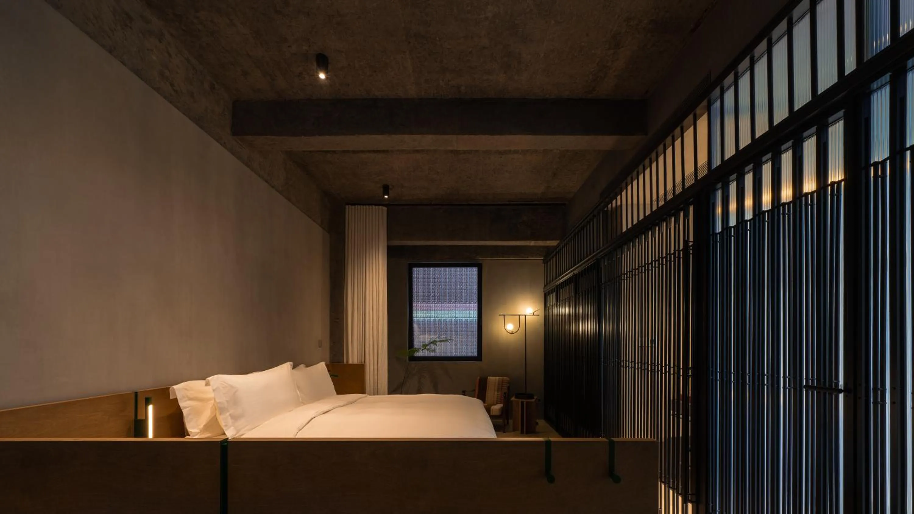 Photo of the whole room, Bed in Jiangnan House Nantou