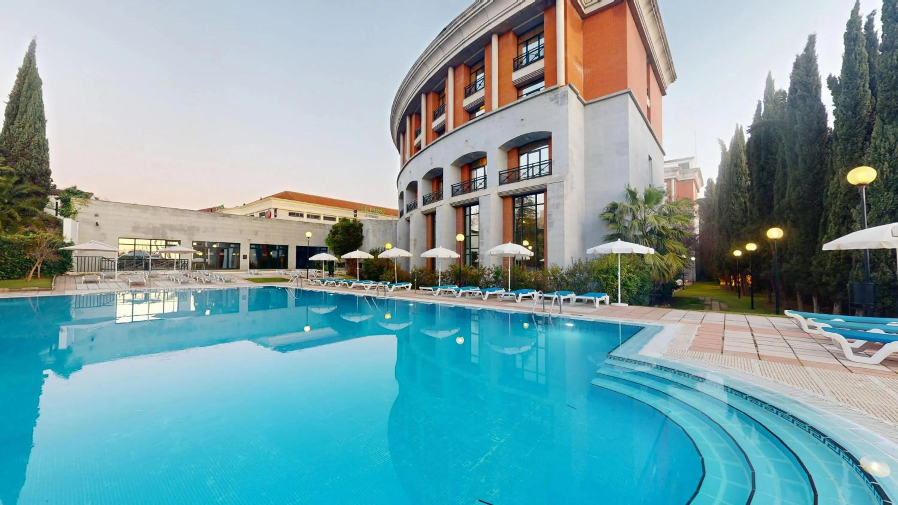 Swimming pool in AZZ Mérida Medea Hotel