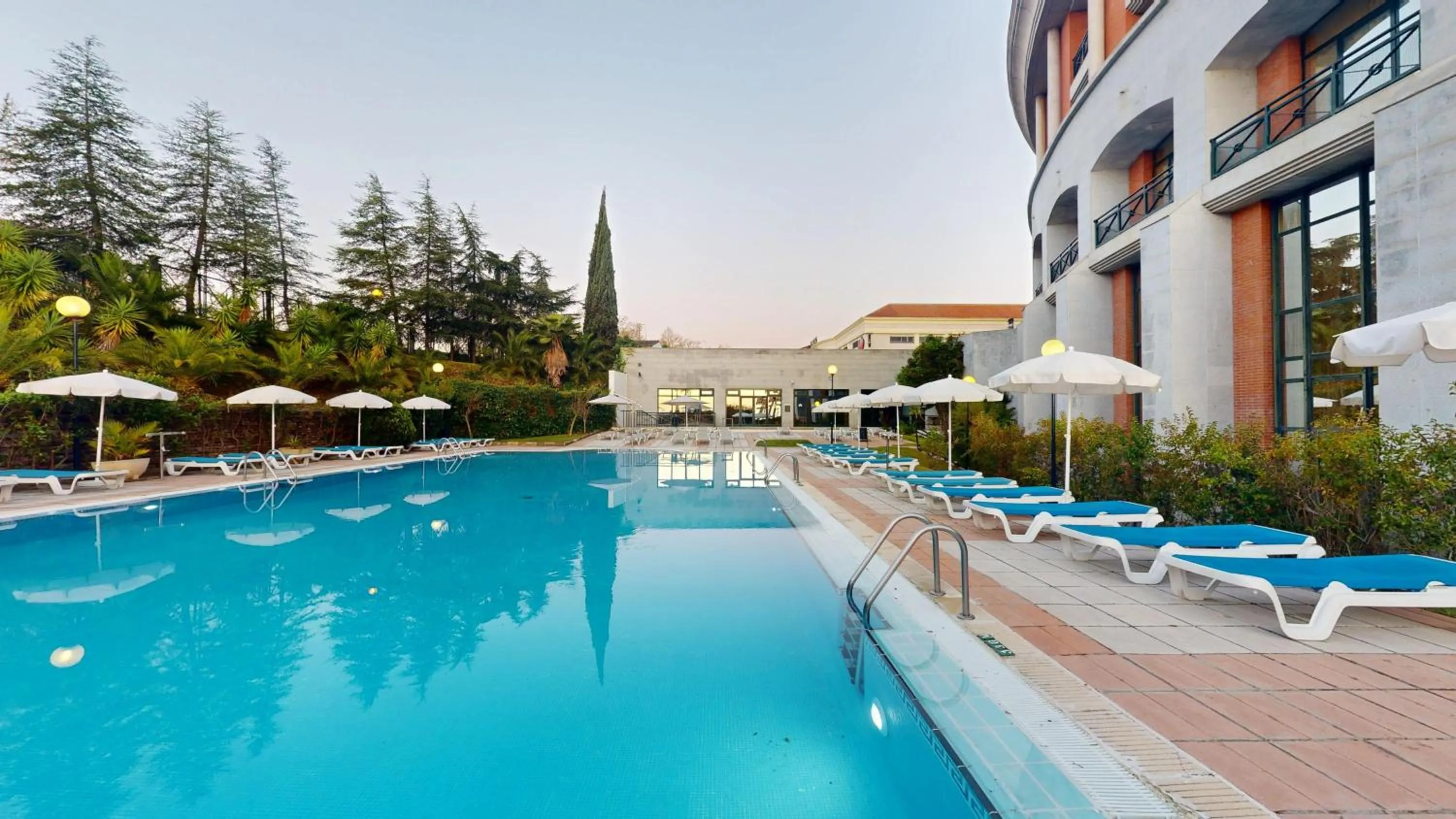 Swimming pool in AZZ Mérida Medea Hotel