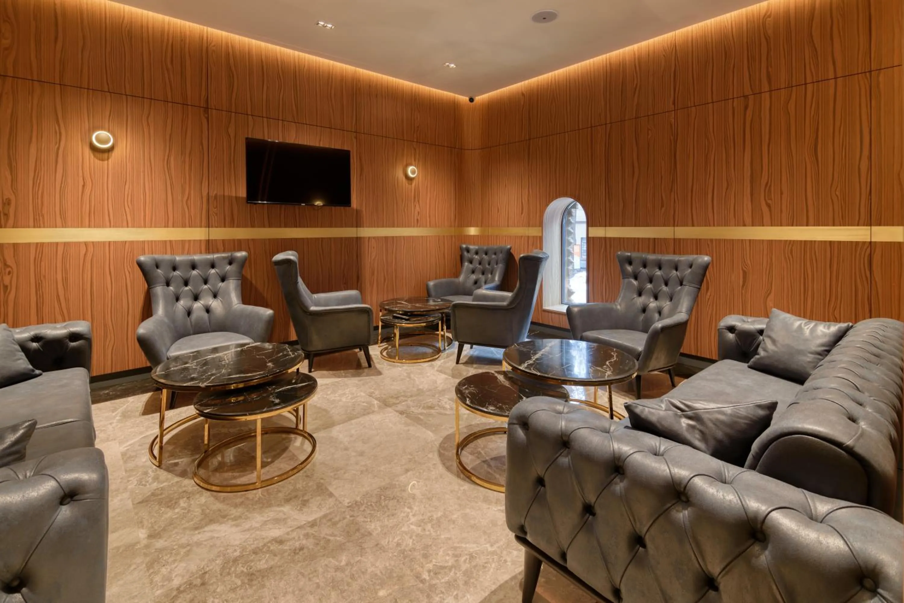 Communal lounge/ TV room in Hayasa Hotel Yerevan