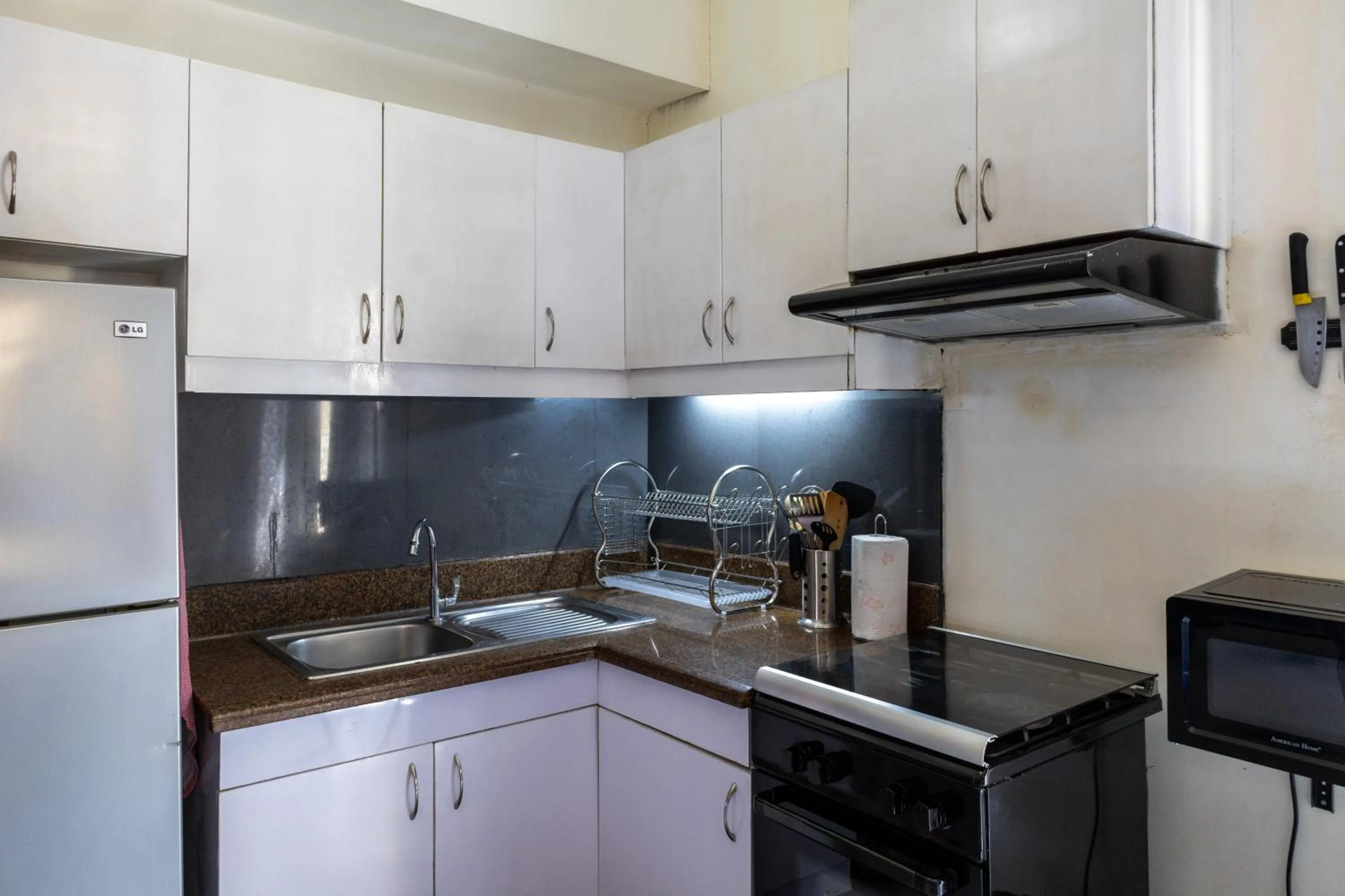 minibar in Spacious Penthouse Near NAIA with 24-7 Convenience